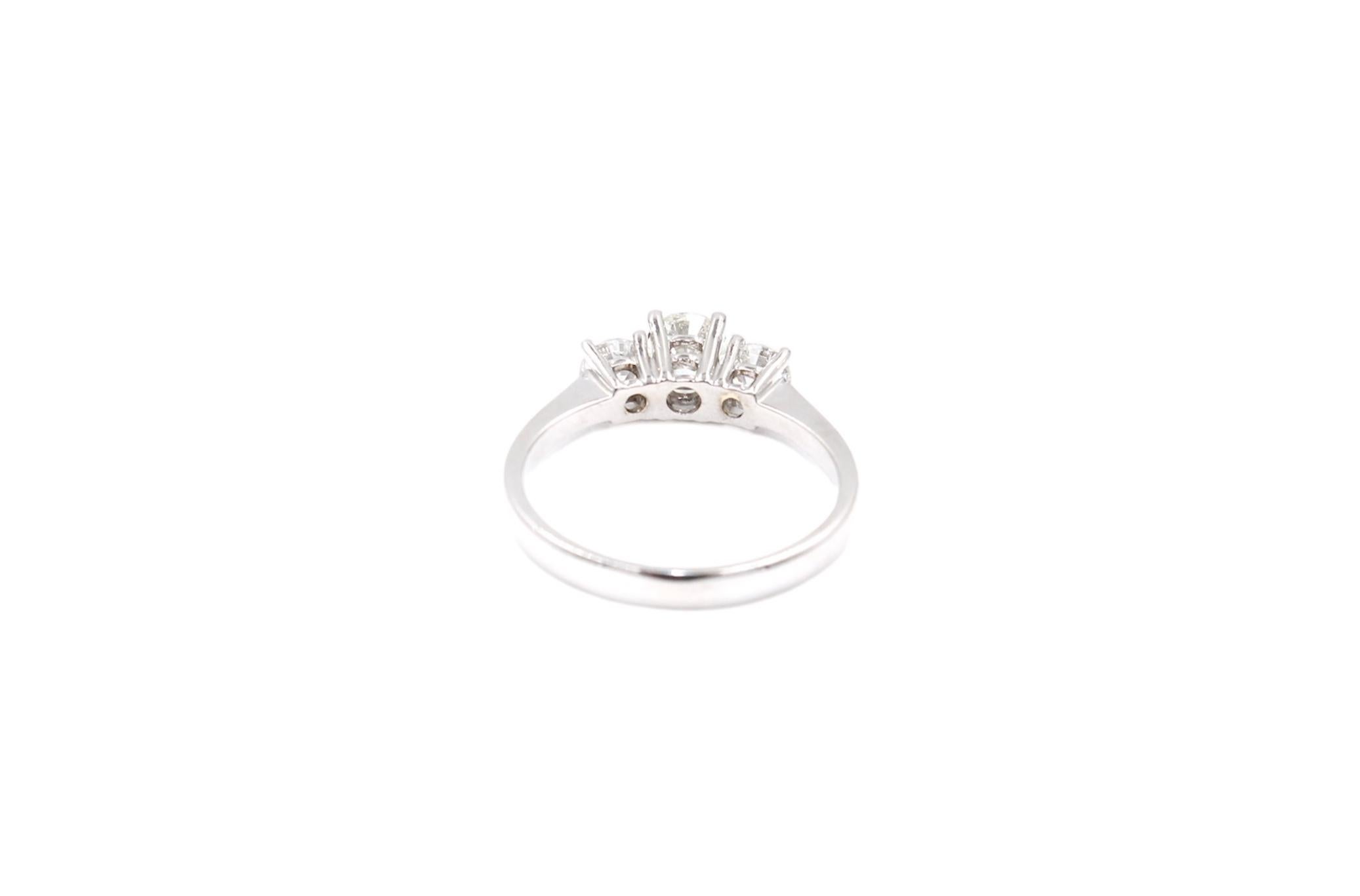 Round Cut Trilogy 1.08 Carats Diamond Ring For Sale