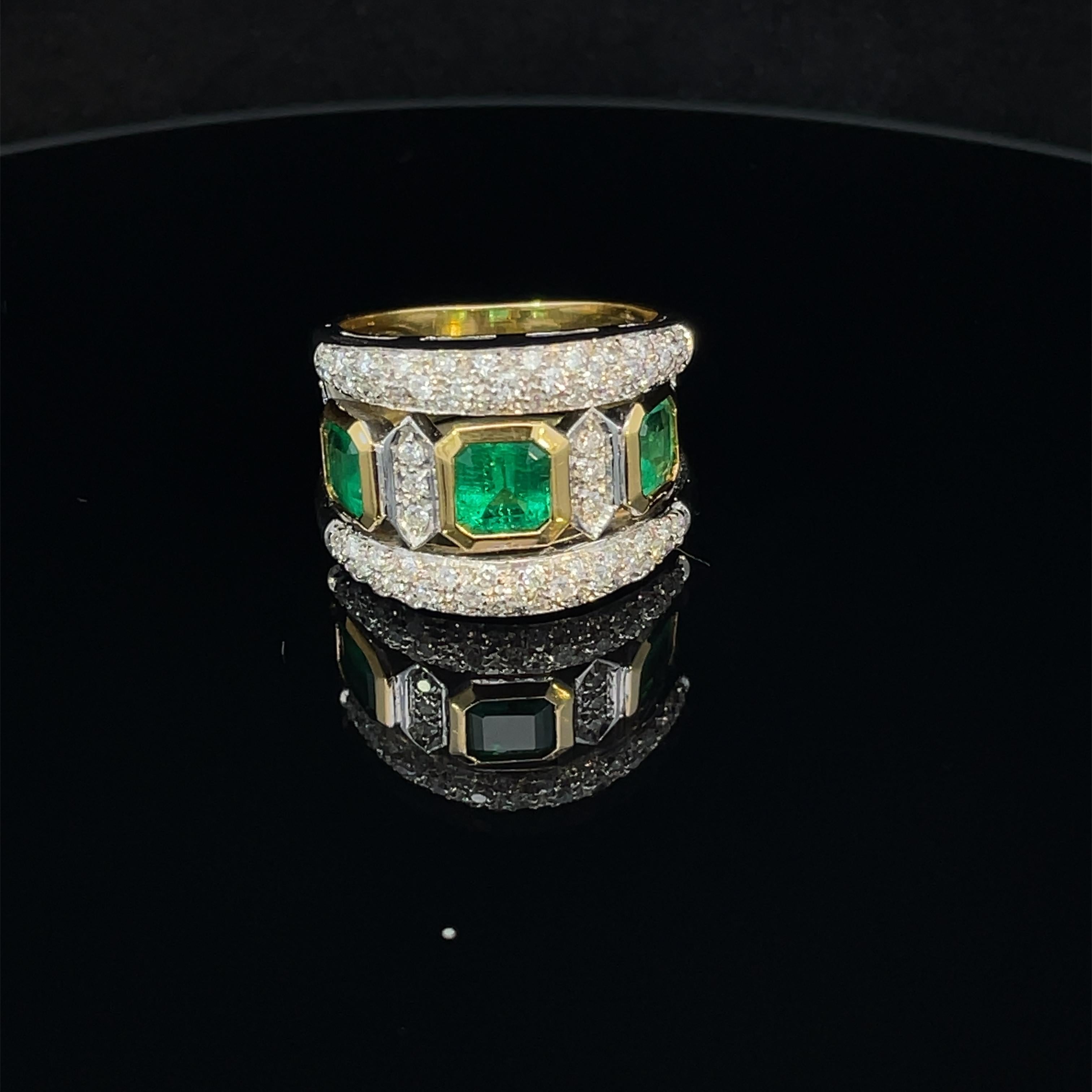 Emerald Cut Trilogy Emerald and Diamonds Ring