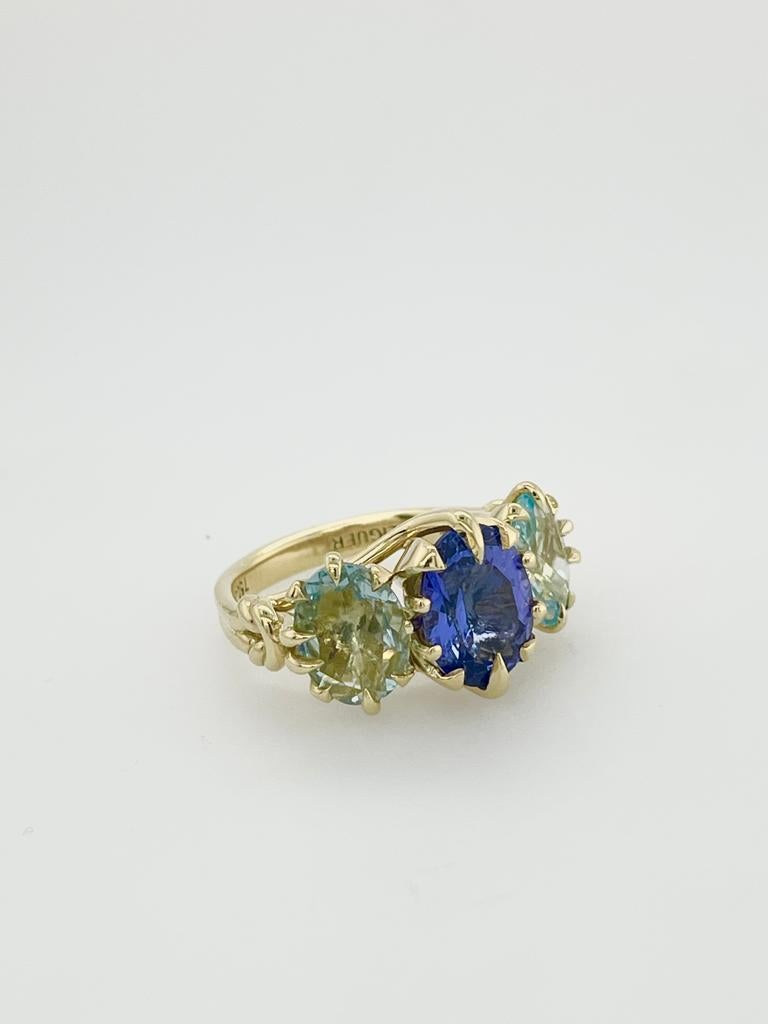 For Sale:  Trilogy Three Stone Blue Tanzanite and Aquamarine Ring in 18ct Yellow Gold 2