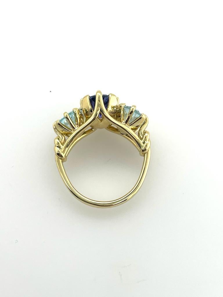 For Sale:  Trilogy Three Stone Blue Tanzanite and Aquamarine Ring in 18ct Yellow Gold 7