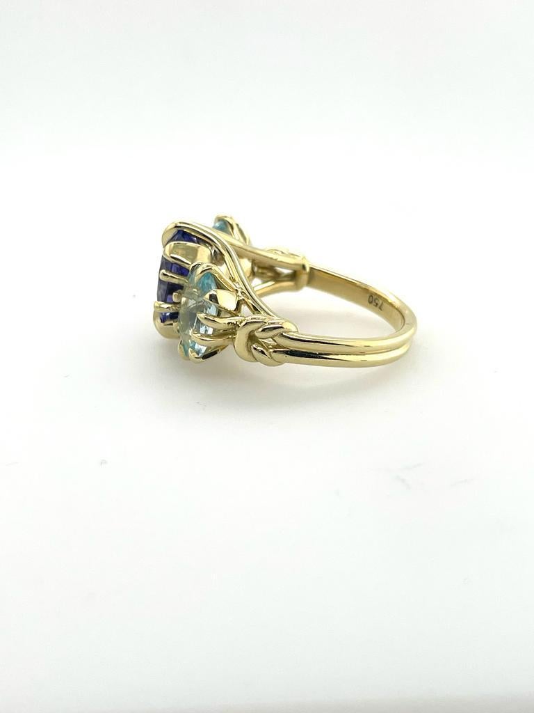 For Sale:  Trilogy Three Stone Blue Tanzanite and Aquamarine Ring in 18ct Yellow Gold 8