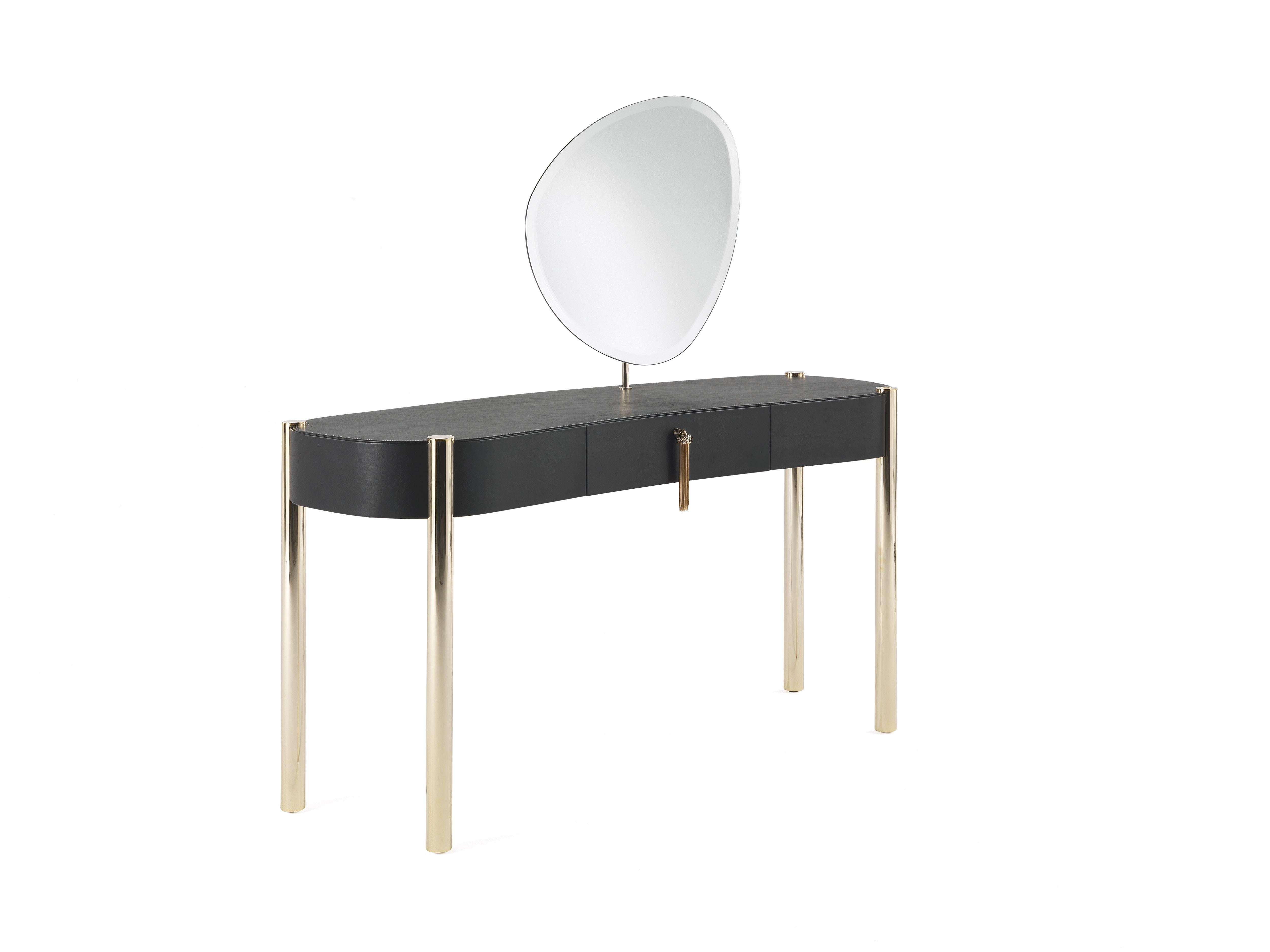 Trinidad Dressing table with mirror with structure in multi-layer wood covered with leather CAT.A Sauvage COL. Black. Inside finishing in microfiber. Metal legs in gold finishing. “Jewel handle” in cast brass gold finishing. Oval natural mirror.
 