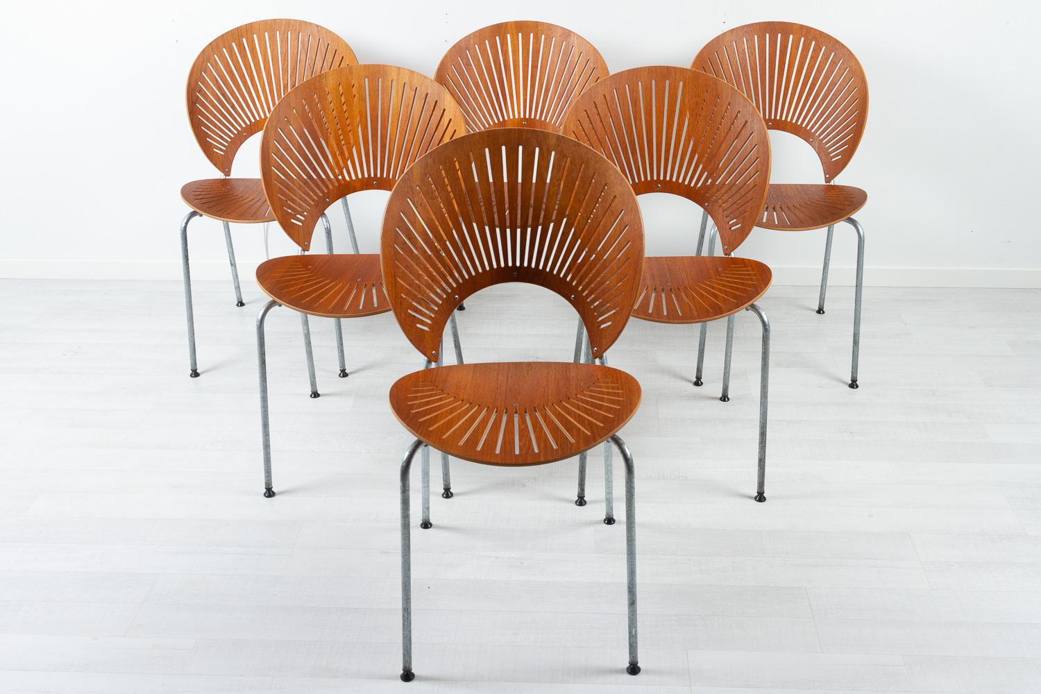 Trinidad teak dining chairs by Nanna Ditzel for Fredericia Stolefabrik Denmark 1990s

When designing the Trinidad Chair Model 3298 in 1993, Danish designer Nanna Ditzel found inspiration in the elaborate fretwork from the Gingerbread Facades that
