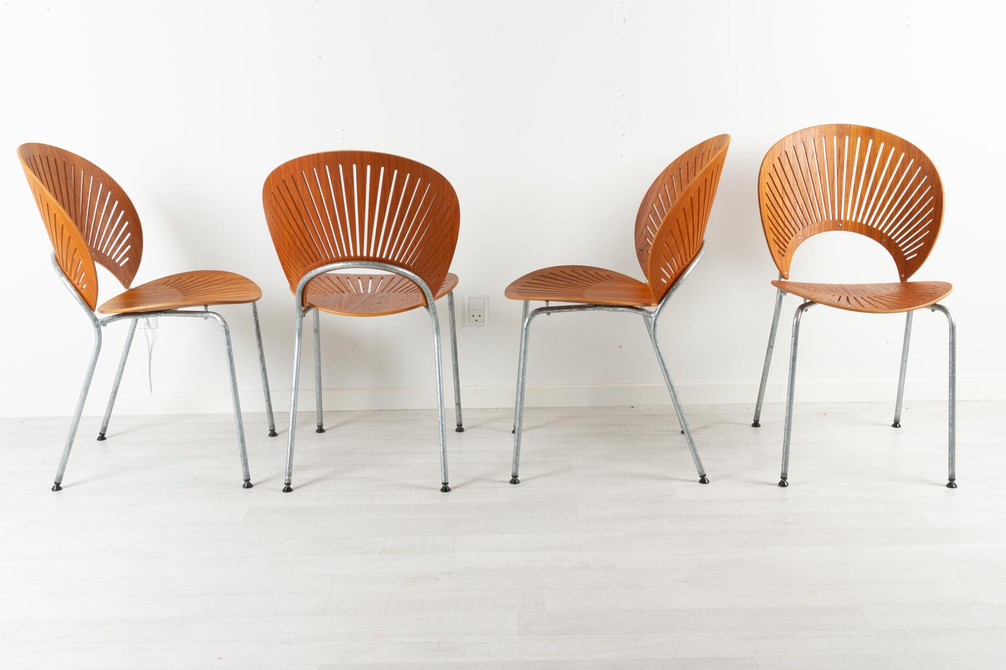 Chaises de salle à manger en teck par Nanna Ditzel pour Fredericia Stolefabrik Danemark années 1990

Lors de la conception de la Trinidad Chair, modèle 3298, en 1993, la designer danoise Nanna Ditzel s'est inspirée des frettes élaborées des