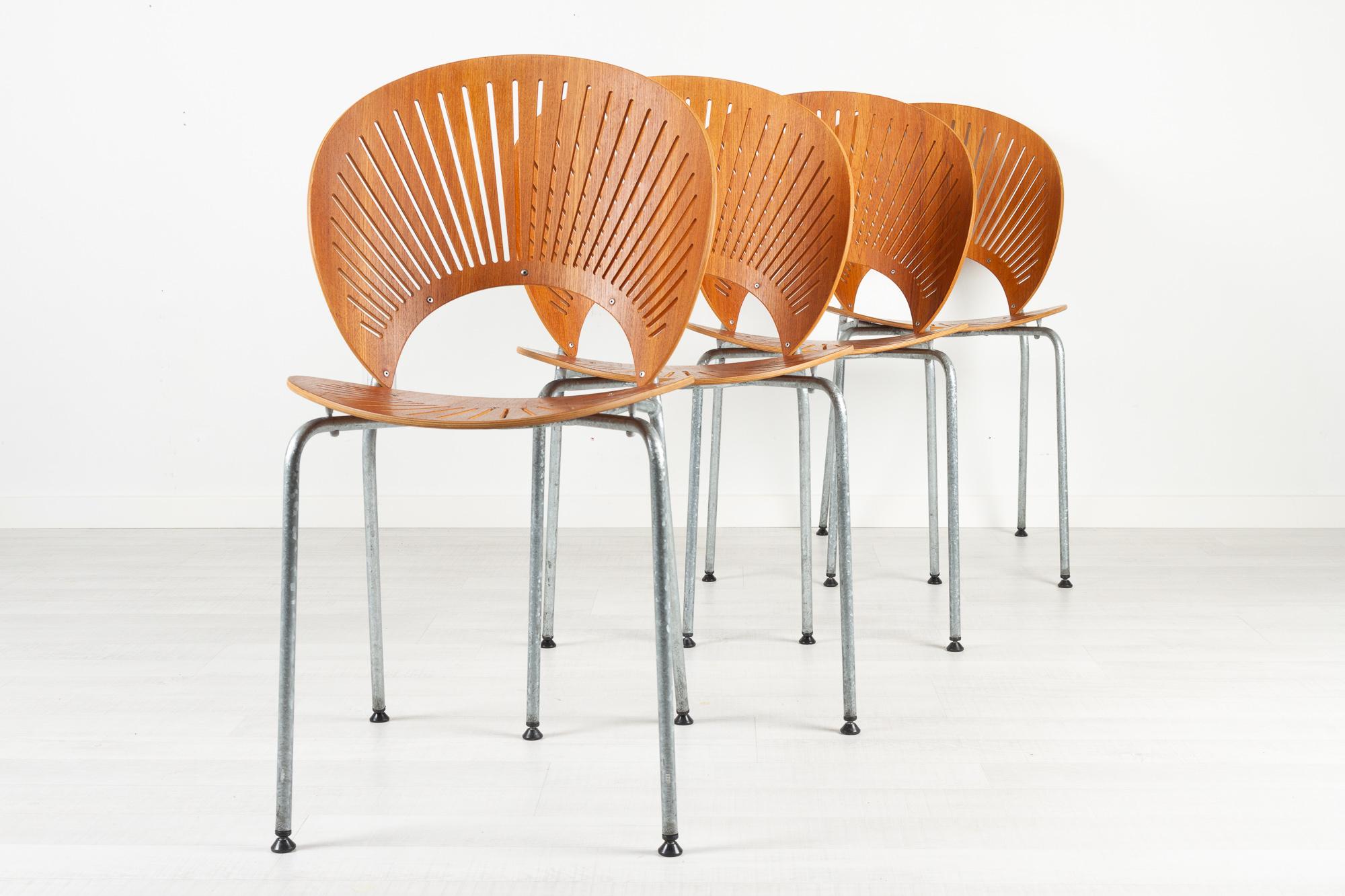 Trinidad teak dining chairs by Nanna Ditzel for Fredericia Stolefabrik Denmark 1990s

When designing the Trinidad Chair Model 3298 in 1993, Danish designer Nanna Ditzel found inspiration in the elaborate fretwork from the Gingerbread Facades that