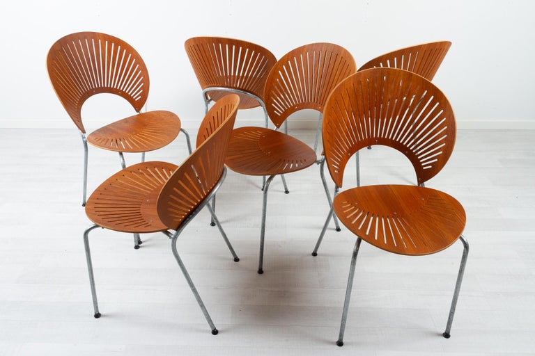 Trinidad teak dining chairs by Nanna Ditzel for Fredericia Stolefabrik Denmark 1990s

When designing the Trinidad Chair Model 3298 in 1993, Danish designer Nanna Ditzel found inspiration in the elaborate fretwork from the Gingerbread Facades that