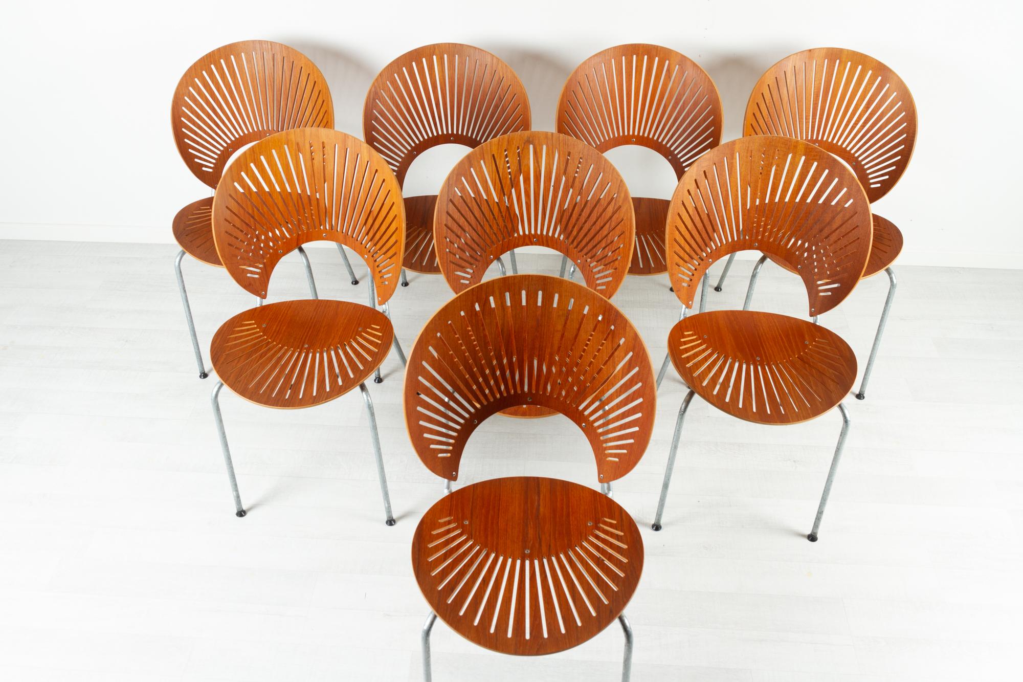 Sedie da pranzo Trinidad in teak di Nanna Ditzel per Fredericia Stolefabrik Danimarca anni '90

Quando nel 1993 progettò la Sedia Trinidad Modello 3298, la designer danese Nanna Ditzel trovò ispirazione negli elaborati trafori delle facciate di