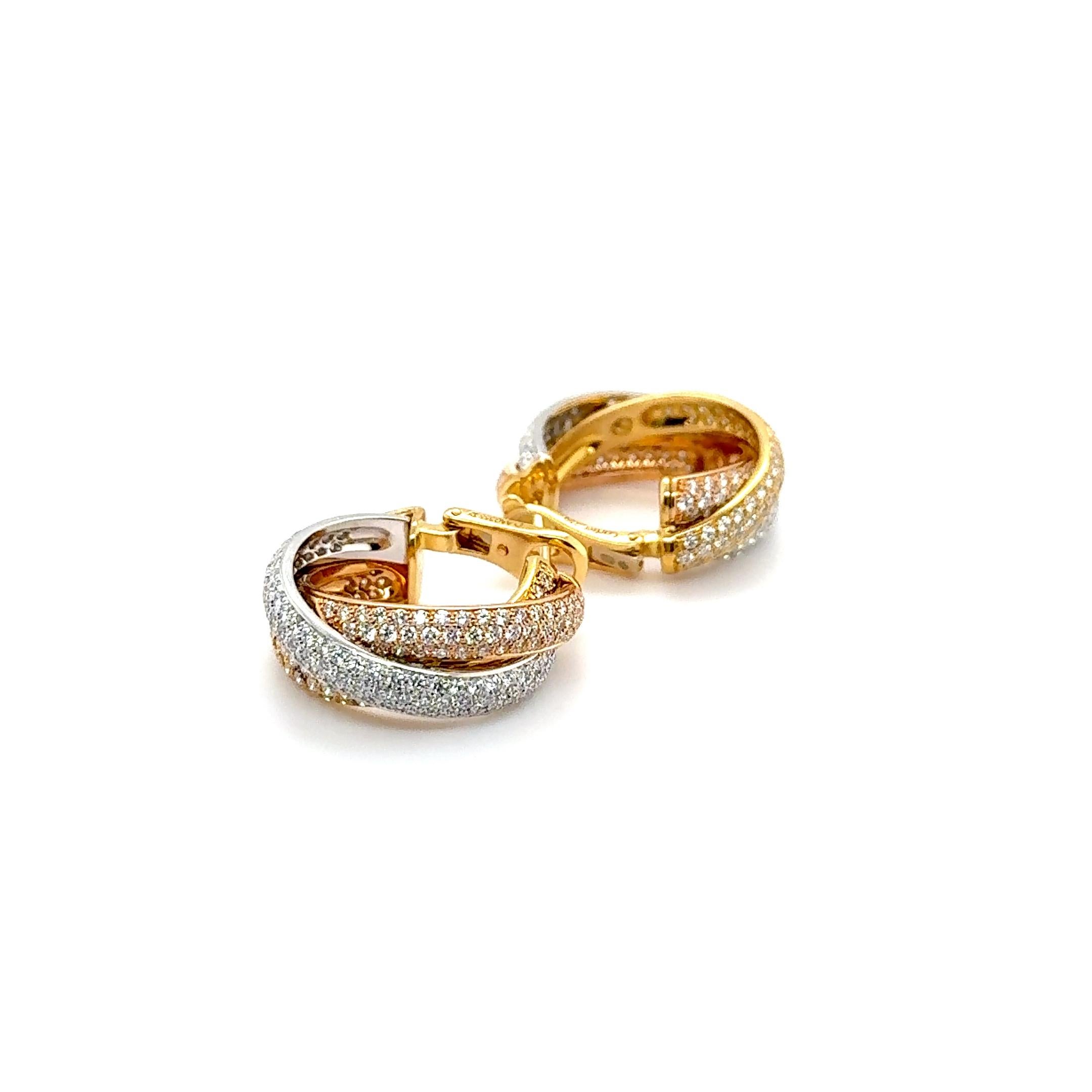 Experience timeless elegance with the Cartier Trinity earrings, a radiant expression of the Maison’s iconic design. Crafted in a harmonious blend of white, yellow and rose gold, these earrings showcase the signature Trinity interlaced motif.