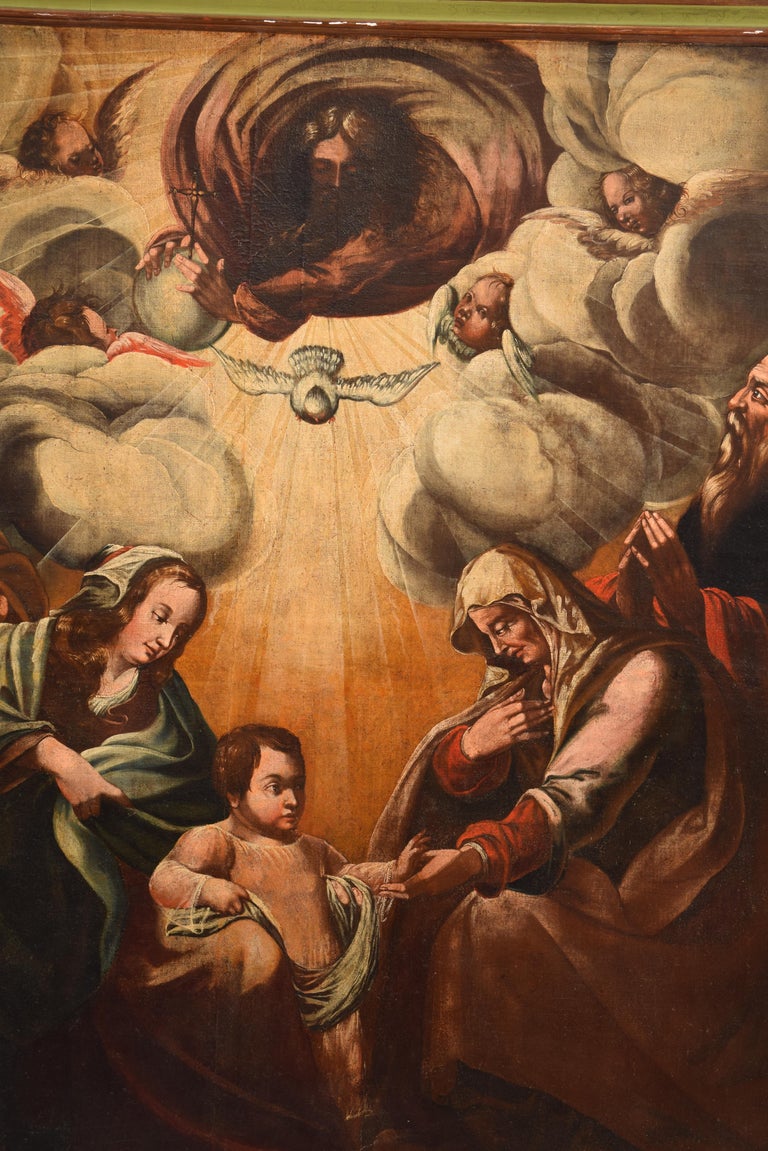 Holy Family with Trinidad and San Joaquín and Santa Ana; Triple Generation. Oil on canvas. Spain, 17th century. 
In the central area of the oil painting is the Child Jesus, under the dove of the Holy Spirit and the figure of God the Father with the