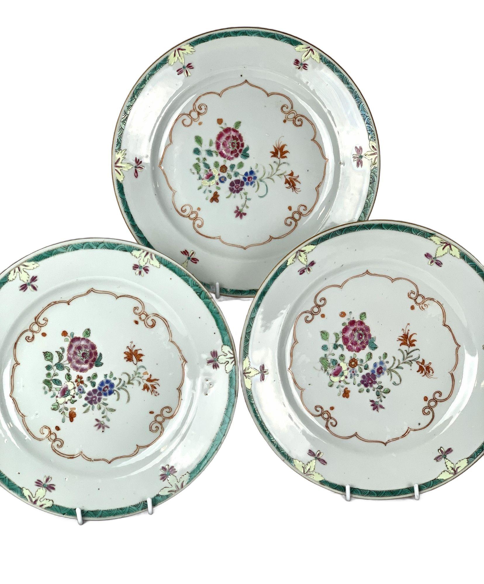 This trio of beautiful Chinese export dishes is decorated in the Famille Rose style.
It features purple peonies, orange lilies, and a variety of other flowers.
In Chinese culture, peonies are known as the 