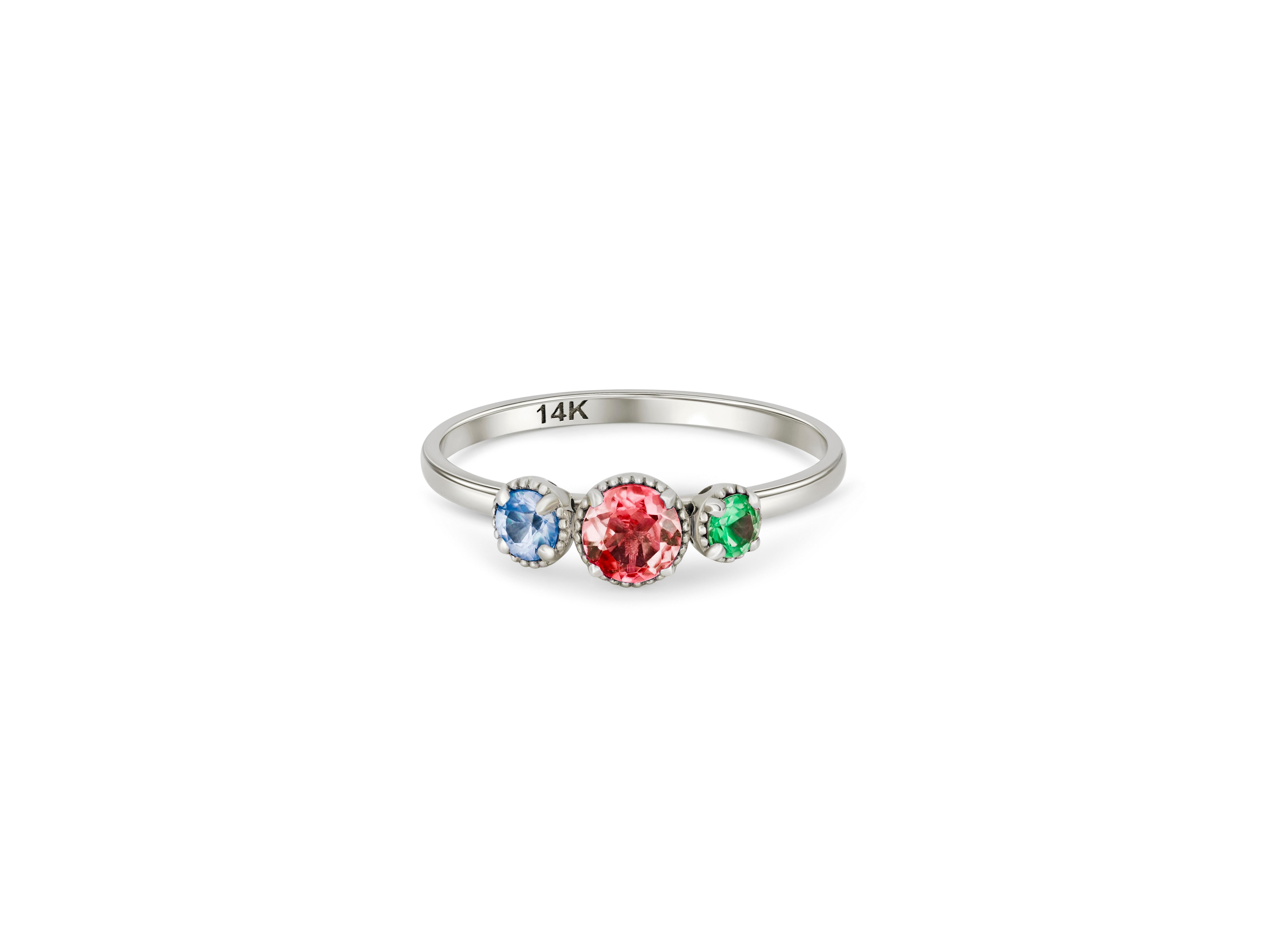 Trio gems 14k gold ring
3 gemstone palette 14k gold ring.  Topaz, ruby, emerald 14k gold ring.  Color contrast gold ring. Pink, blue and green gemstone ring. 

Metal: 14k gold
Weight: 1.8 gr depends from size

Gemstones:
Blue: lab topaz, round