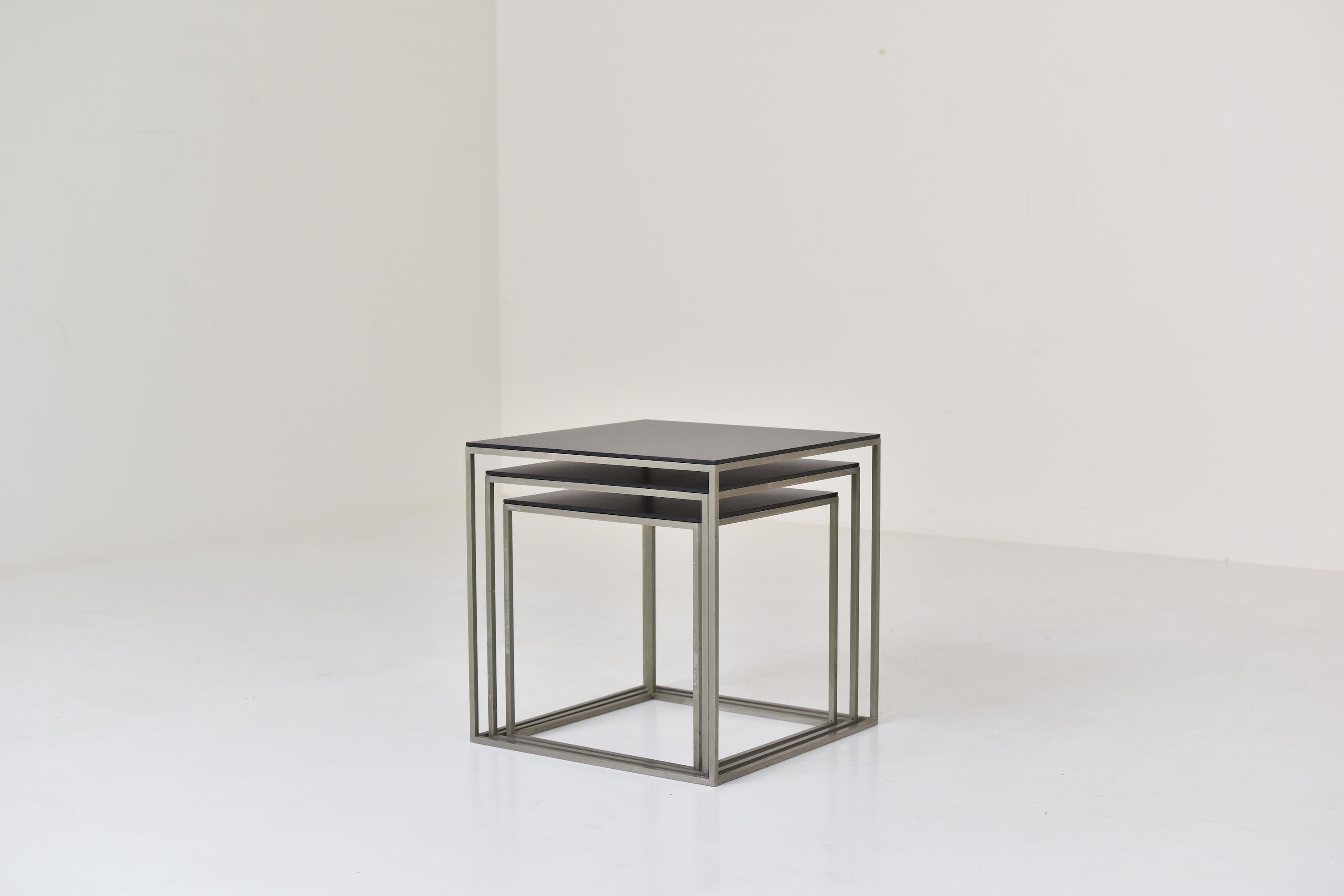 Interesting trio nesting tables, similar to the PK71 by Poul Kjaerholm for Ejvind Kold Christensen. This early set dates from the 1960s and features a matt chrome plated steel frame and (later) black lacquered tops. Unsigned.