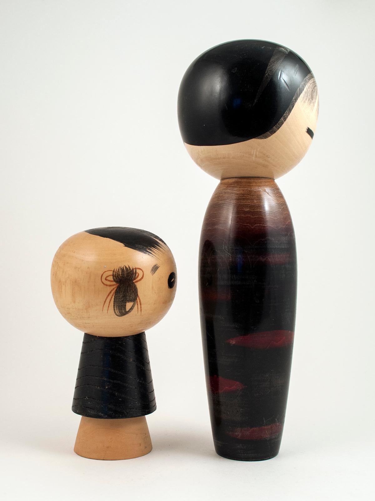 Two 1960s modern creative Kokeshi Dolls by Masao Watanabe, Japan

Masao Watanabe (1917-2007) was a highly regarded artist of the Sosaku Kokeshi Movement, receiving numerous awards during his career.

The first doll is named 