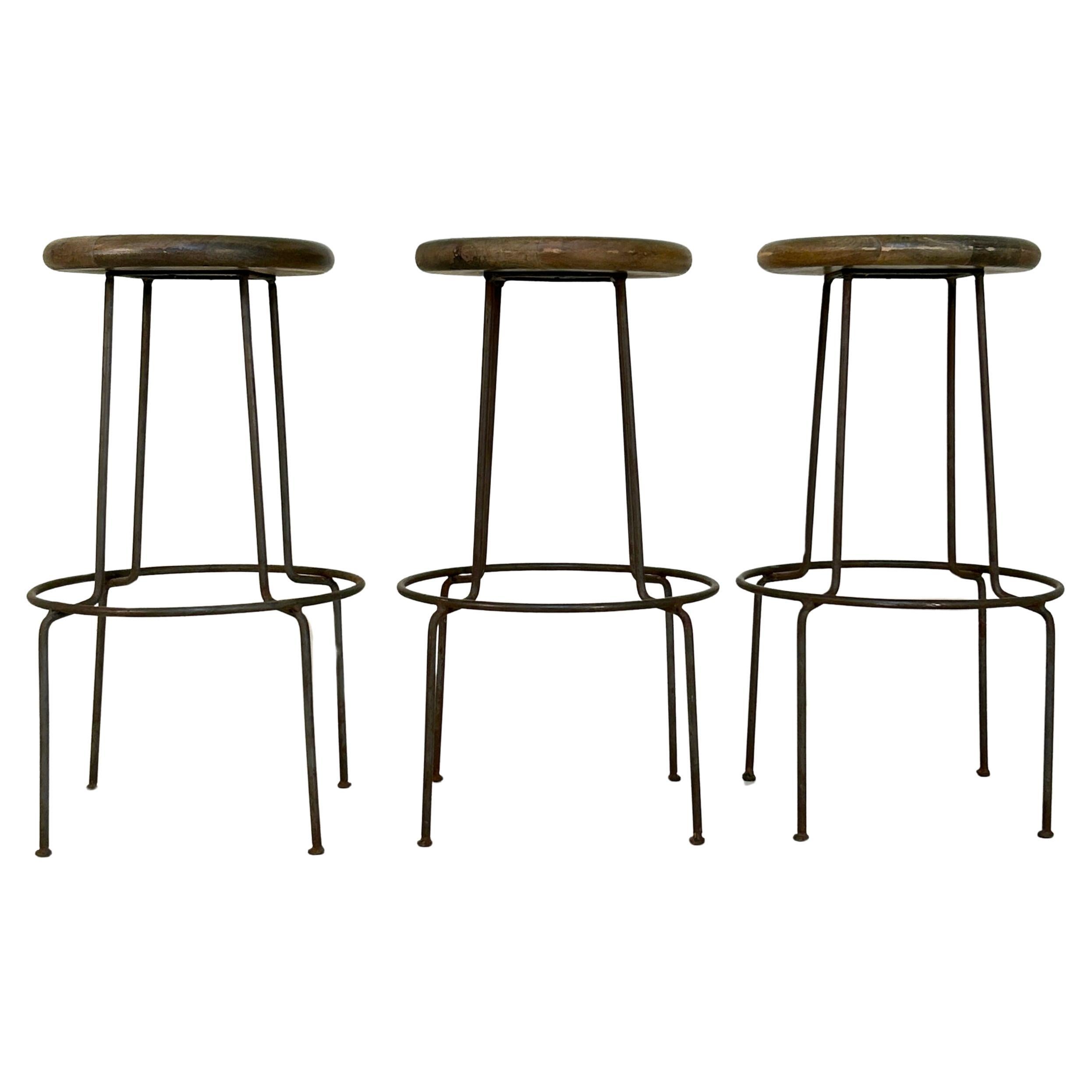 Trio of 3 cerused distressed oak and iron bar stools For Sale