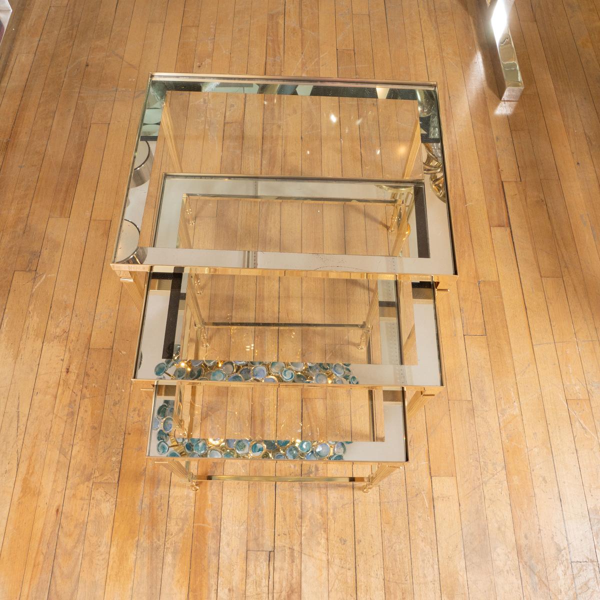 French Trio of brass and glass nesting tables For Sale
