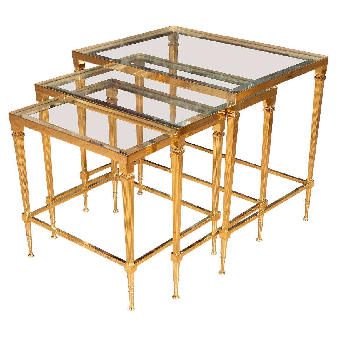 Trio of brass and glass nesting tables For Sale