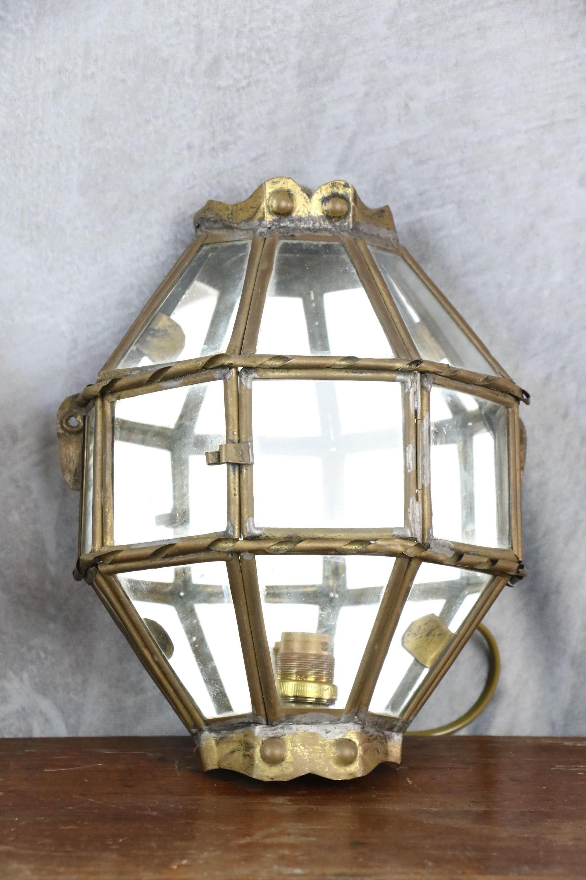 brass and glass lantern wall lamp