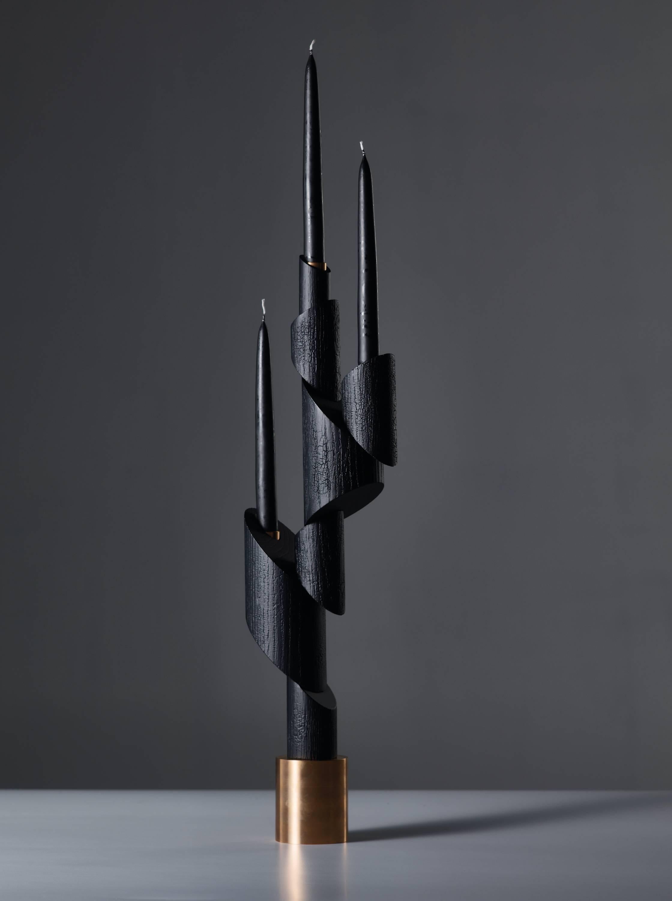 Trio of bronze chandeliers 'Ashes to Ashes' - Signed William Guillon
Signed William Guillon
Limited edition of 99
Signed and numbered
Solid burnt oak / Solid bronze
Dimensions: 65 x 19.7 x 9 cm (Height with candle: 88 cm) 
Heights of the two