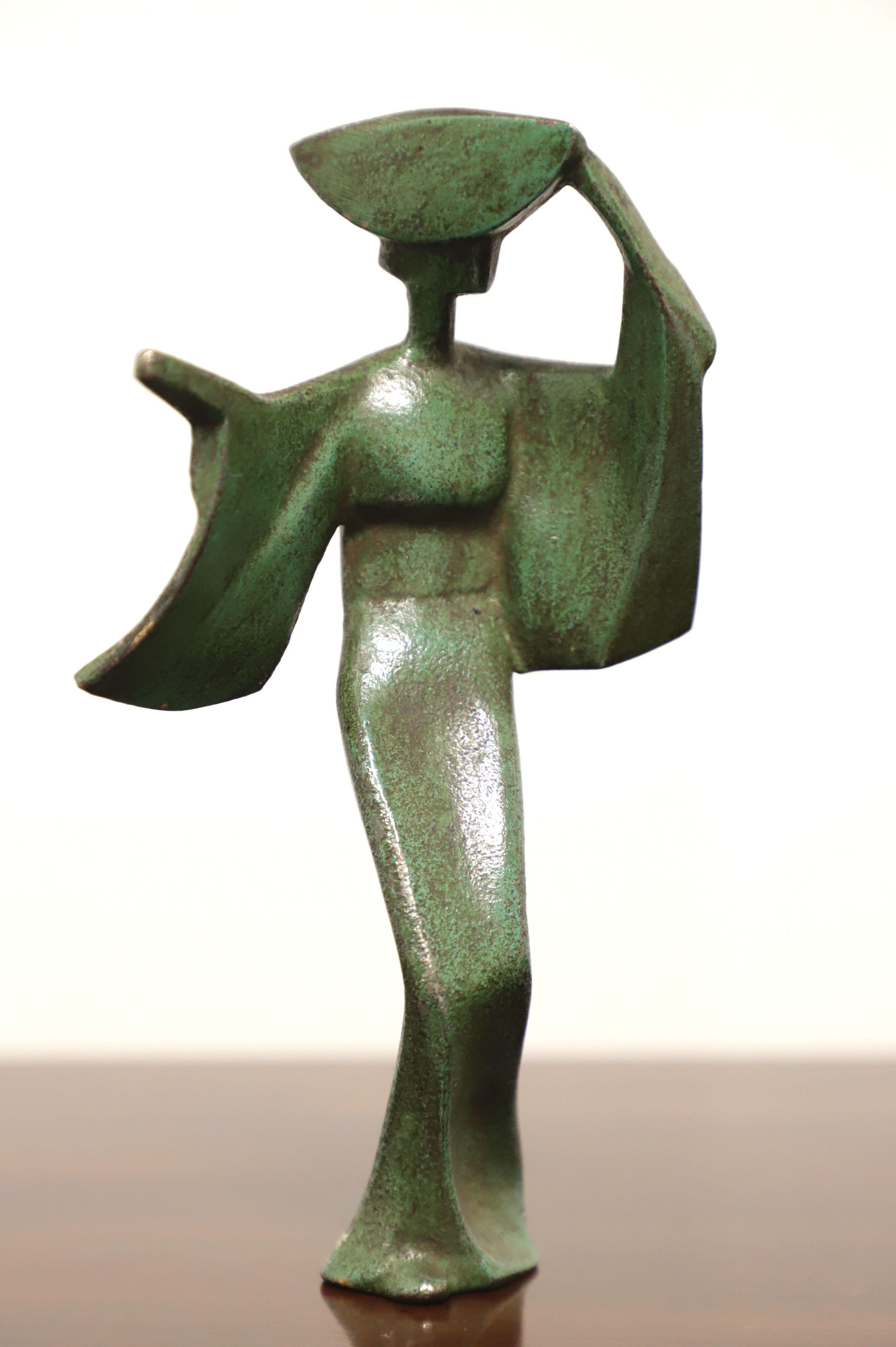 A trio of mid 20th Century bronze decorative sculptures depicting three Japanese Awa Odori Dancers from an ancient annual festival held in Japan. Artist unknown. Made in Japan. 

Measures: 