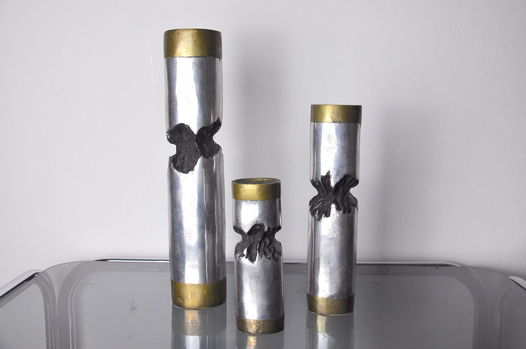 Superb set of brutalized candlesticks designed and made by the artist david marshall around the 70s, spain. Rare works by the artist in brass and silver metal. 

 