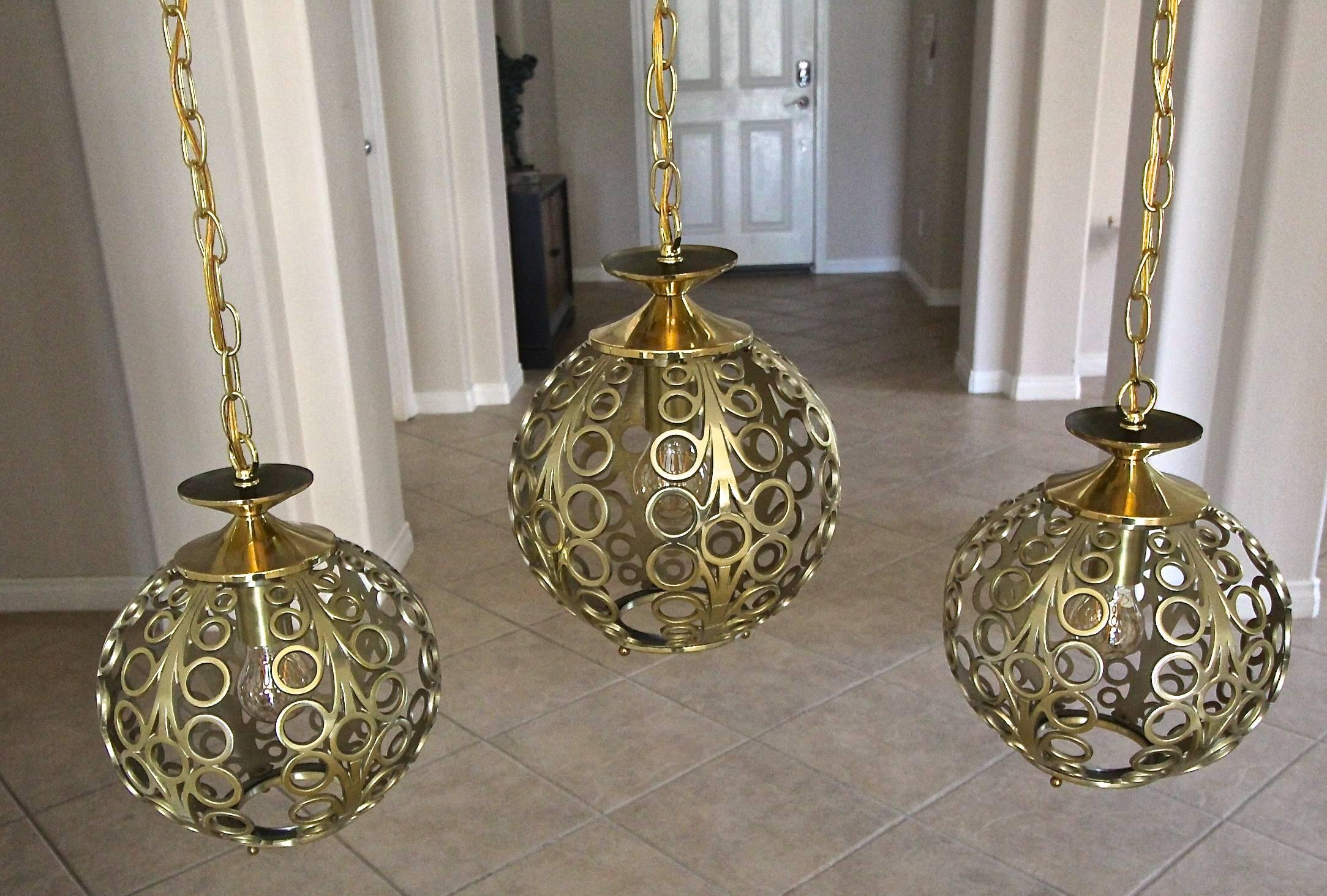 American Trio of Circle Motif Brass Pendant Lights