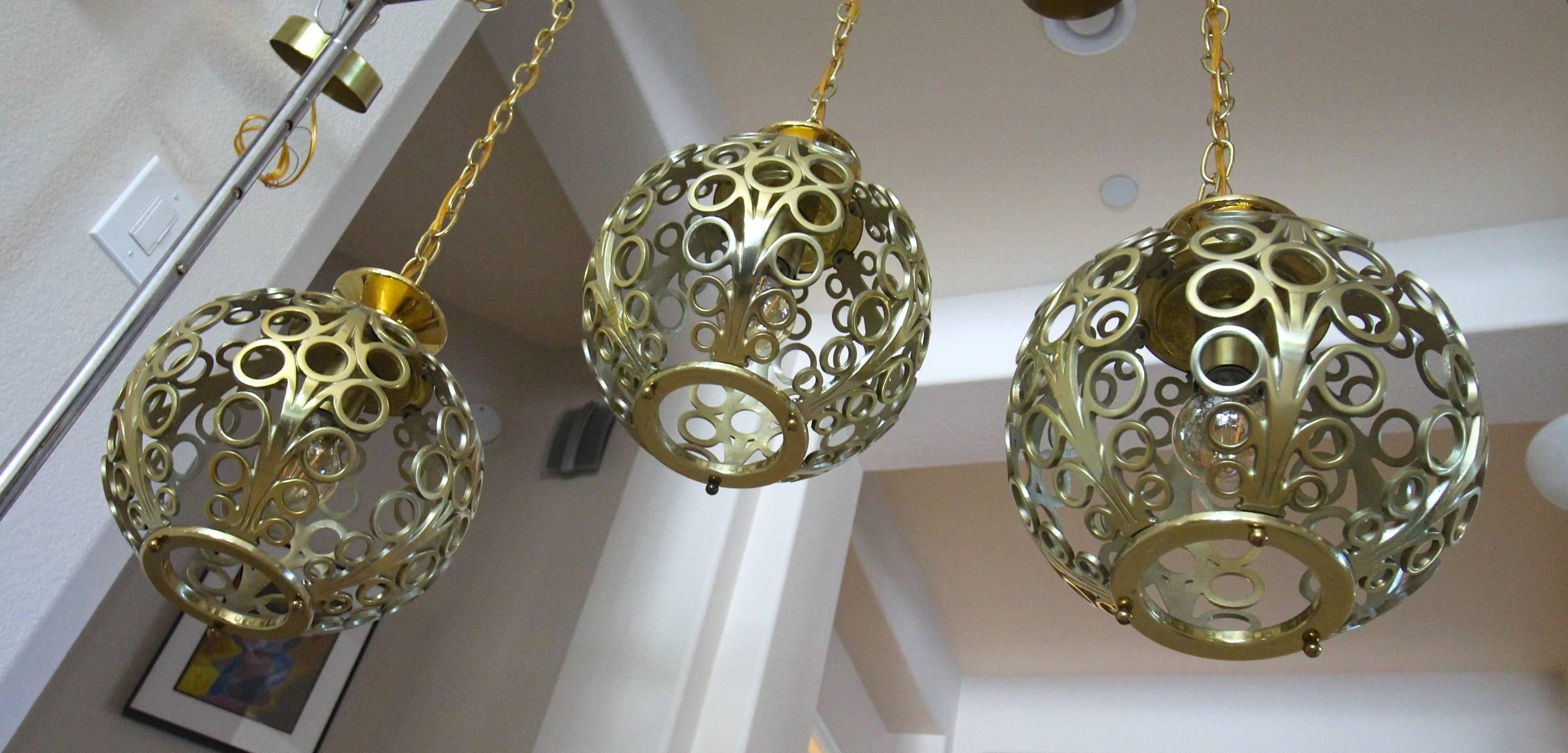 Trio of Circle Motif Brass Pendant Lights In Good Condition In Palm Springs, CA