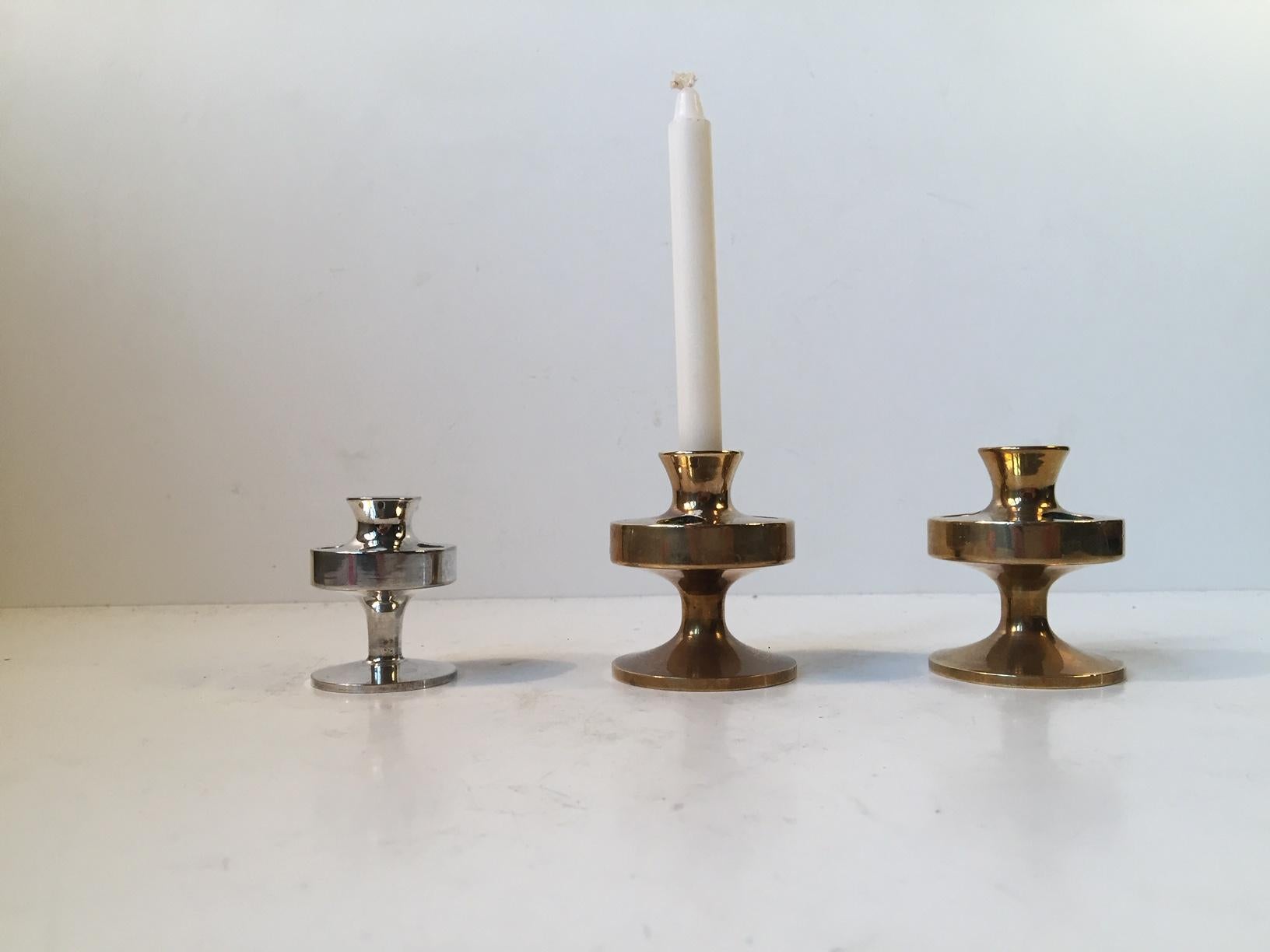 - A set of 3 small taper candleholders
- Two pieces in brass and a silver plated smaller one
- The candleholders can contain 4 and 5 candles
- The silver plated candleholder measures 5 cm in height
- The brass candleholders measure 6 cm in