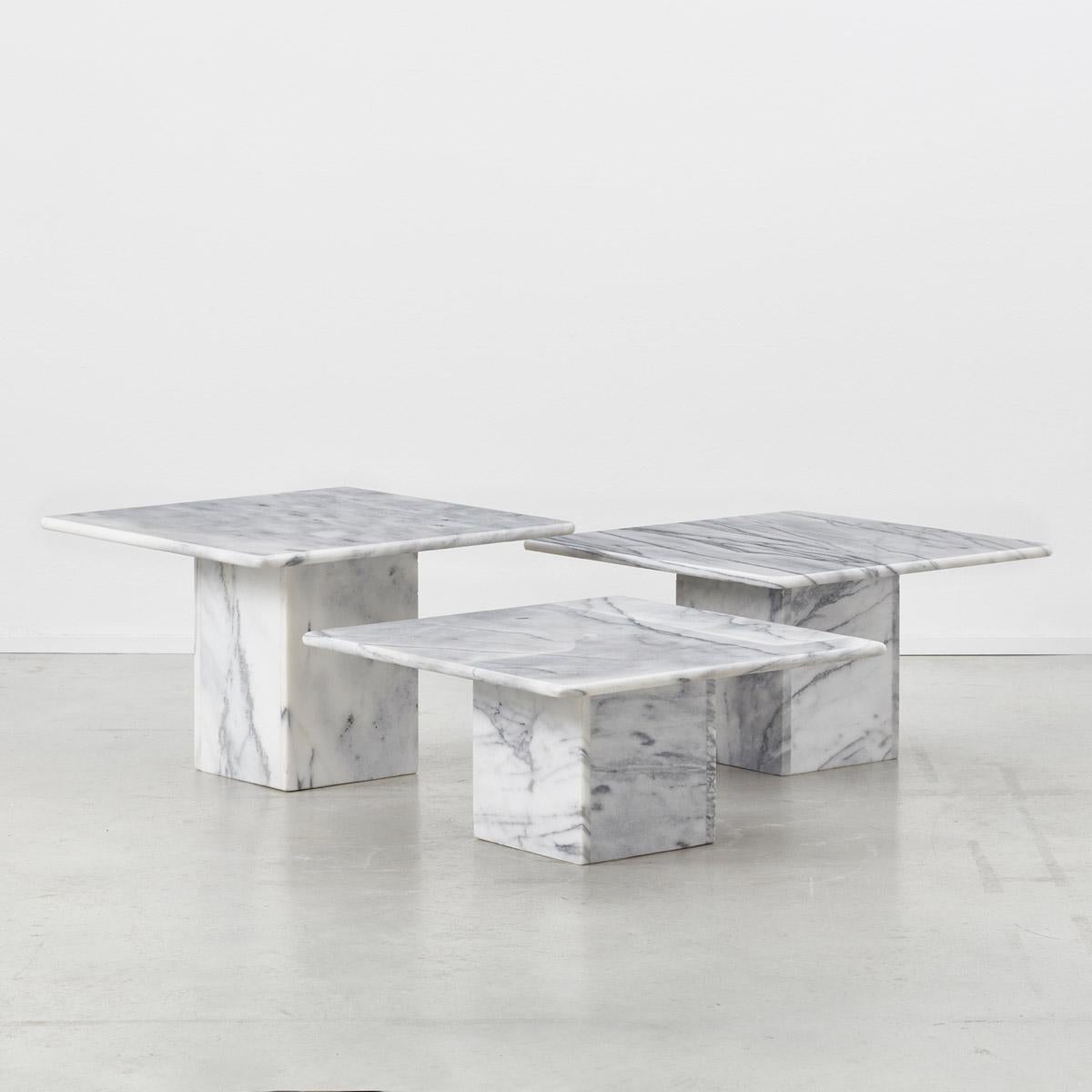 This set of three Carrara marble side tables offer a lot in terms of their versatility. A dynamic coffee table arrangement, low plinths or split them up and use as side tables. Their varying heights allow them to be overlapped in a really satisfying