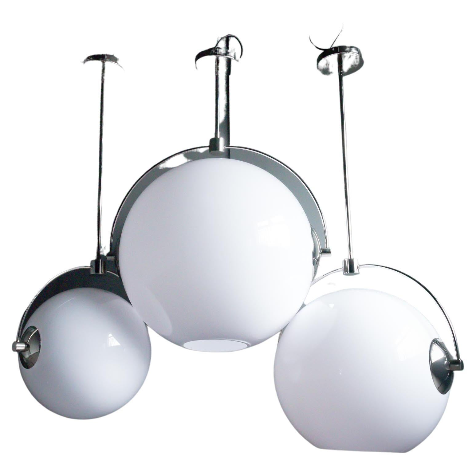 Trio of Mid Century Influenced Globe Ceiling Pendant Lights For Sale