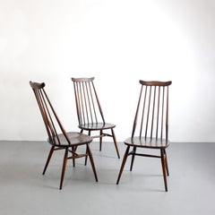Trio of "Moustache" chairs in elm and beech wood with a coffee-brown finish -