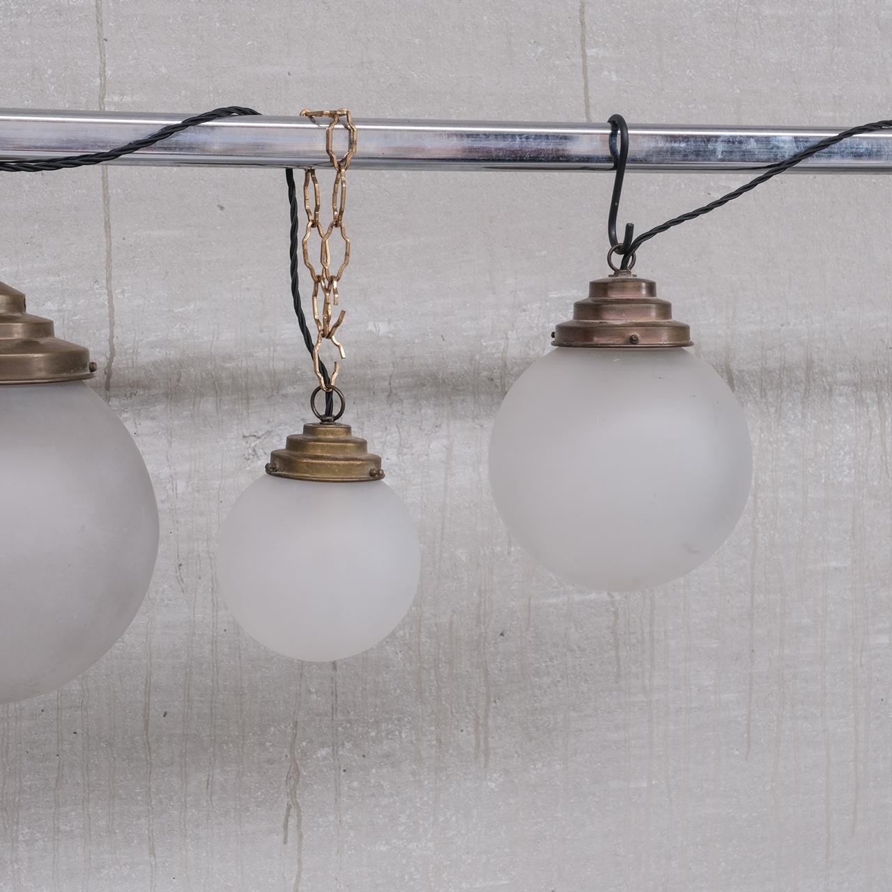 Trio of Opaque Glass and Brass Pendant Lights For Sale 3
