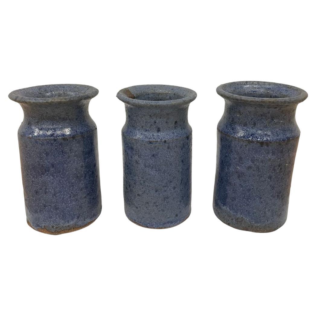 Trio of Petite Mid-Century Blue Pottery Vases For Sale