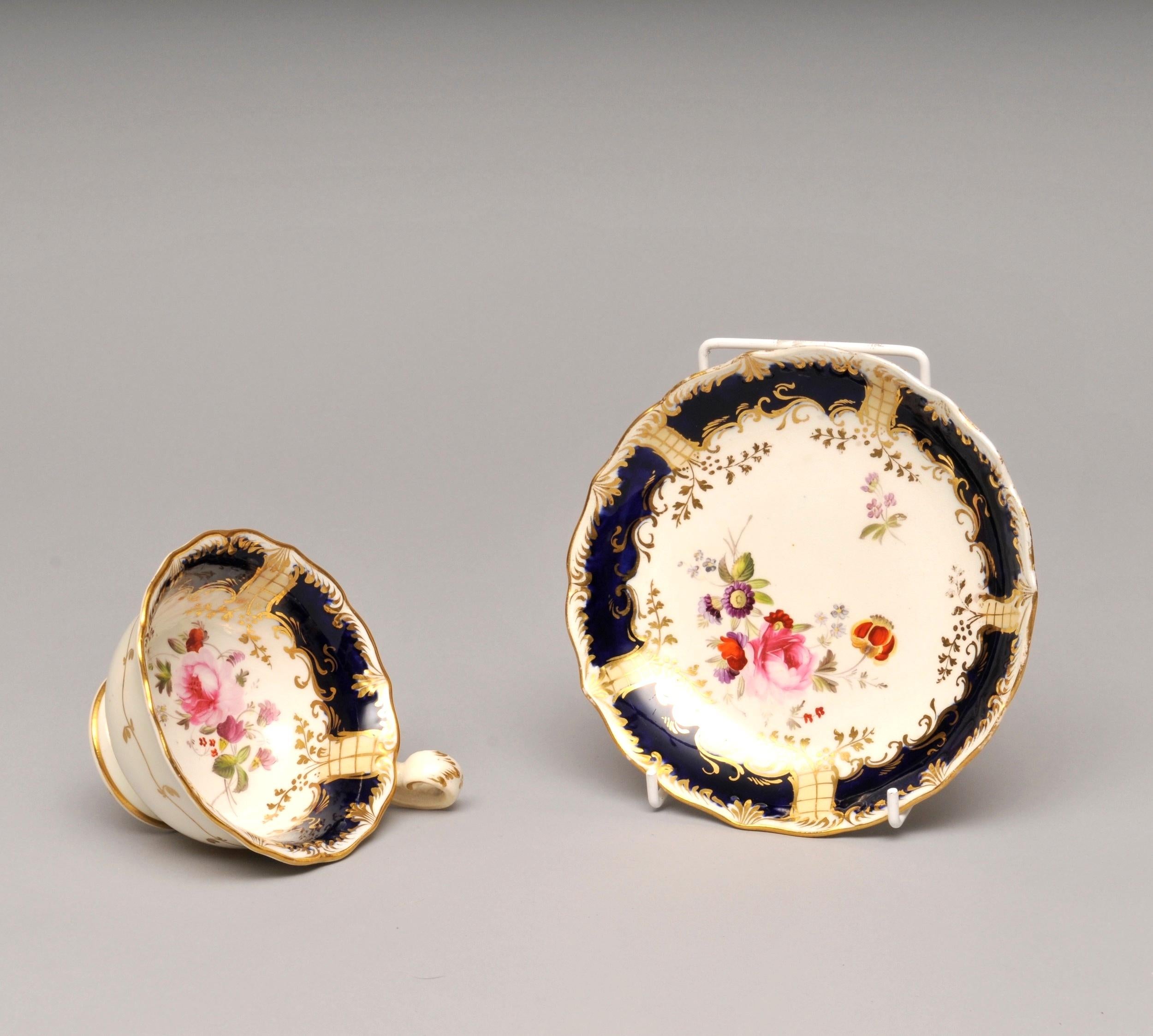 Trio of porcelain, including 2 cups - one shallow one deep and 1 saucer

A beautiful antique cup and saucer set, hand painted with gilt detail, possibly Coalport.