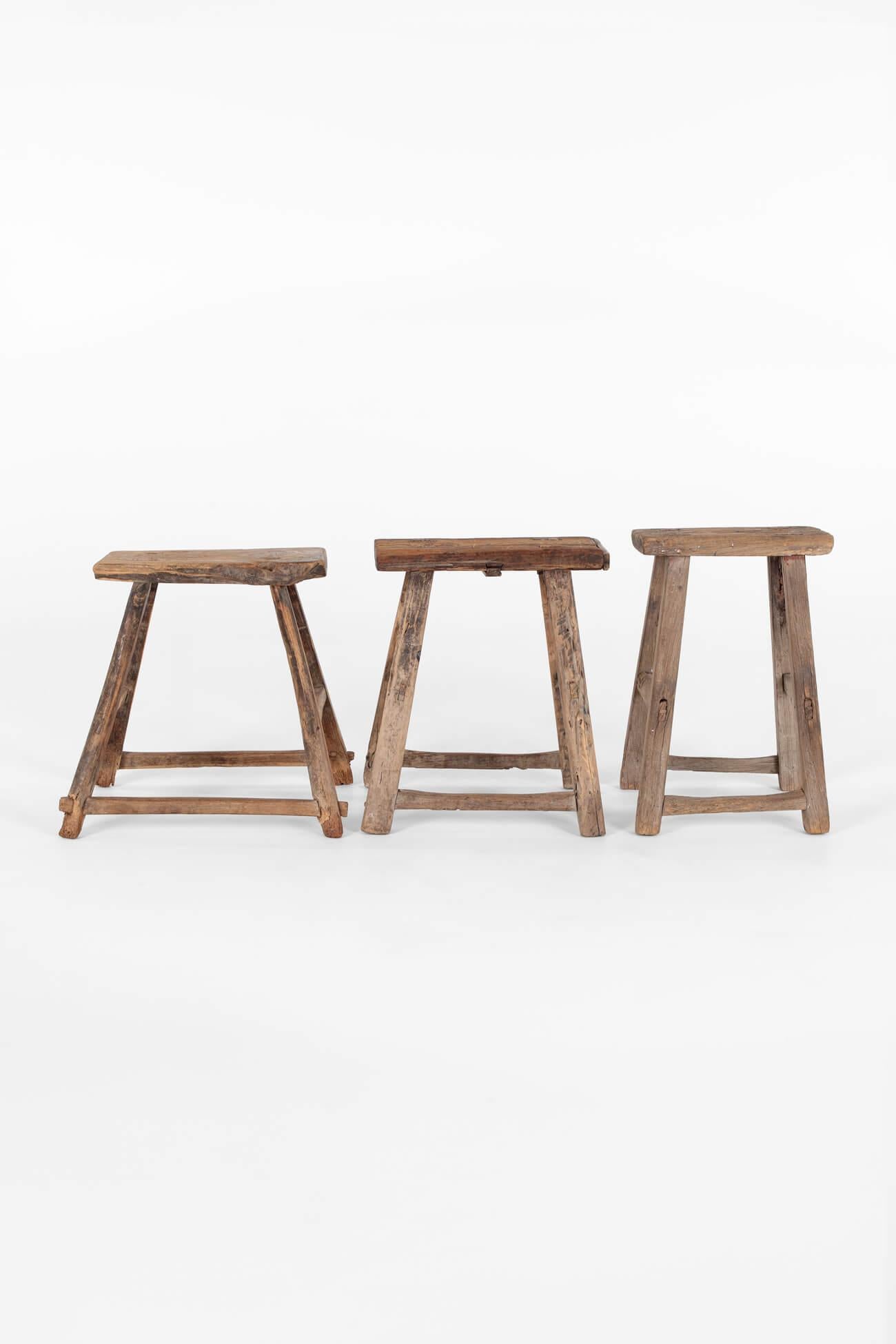 Chinese Trio of Rustic Elm Stools For Sale
