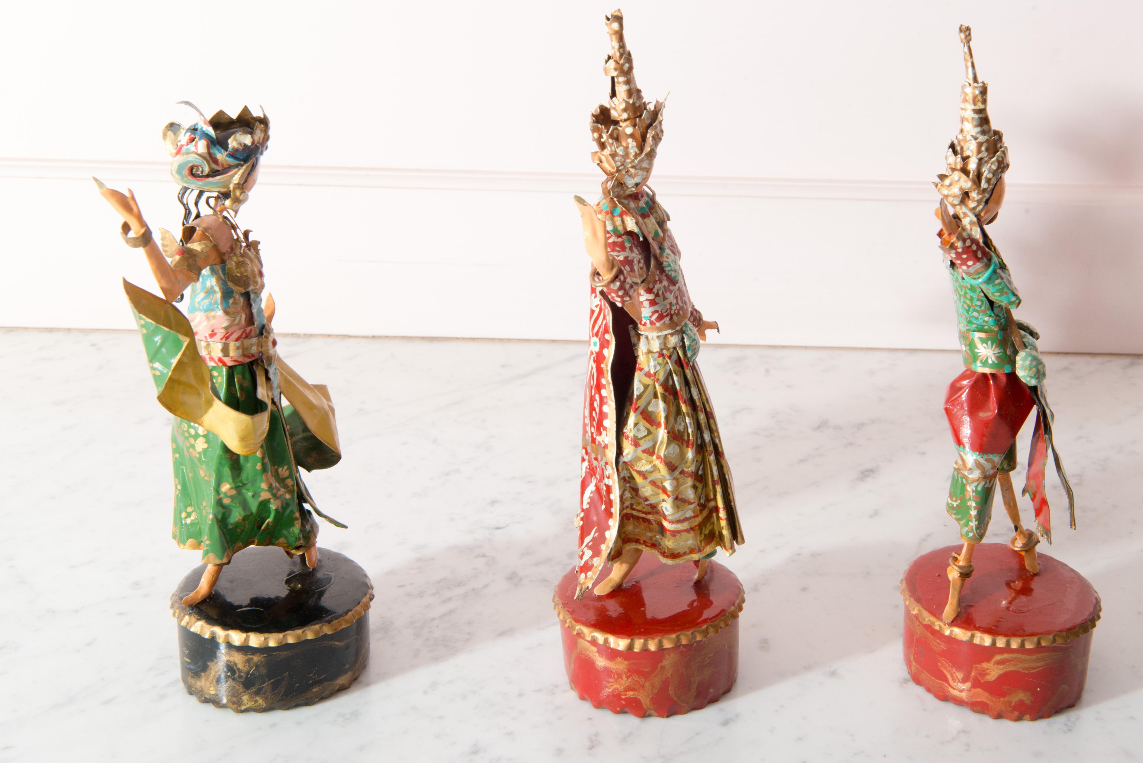 Lee Menichetti, (1931 - 1997) Palm Beach & New York, well known mid-century artist known for his theatre related art. These sculptures are made of hand bent brass and hand painted sheet brass. Characters from the epic period drama 