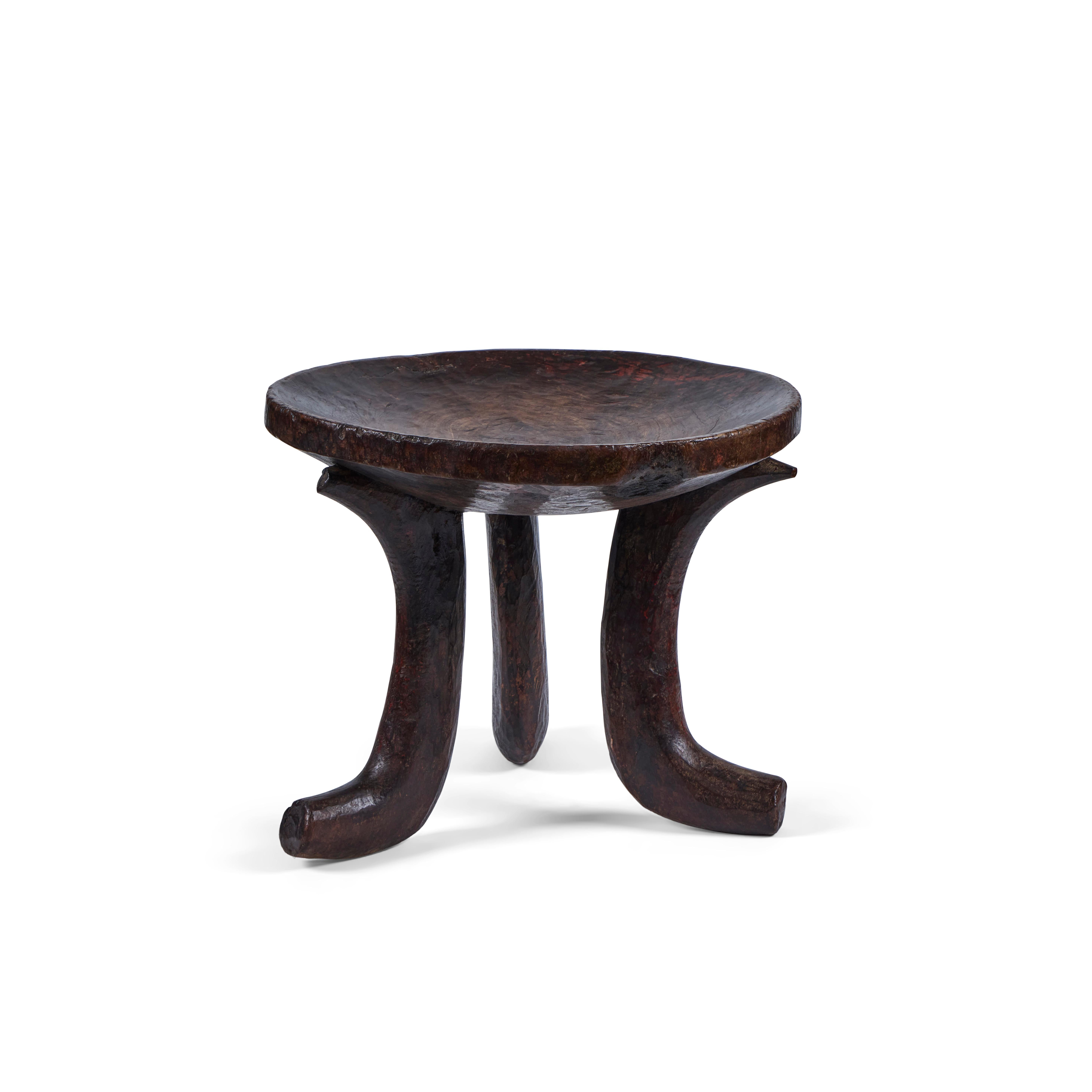 Stylish trio of vintage African stools, most likely Ethiopian, early 20th century.  Perfect design elements for the rustic yet sophisticated aesthetic currently in vogue.  Good vintage condition.  
