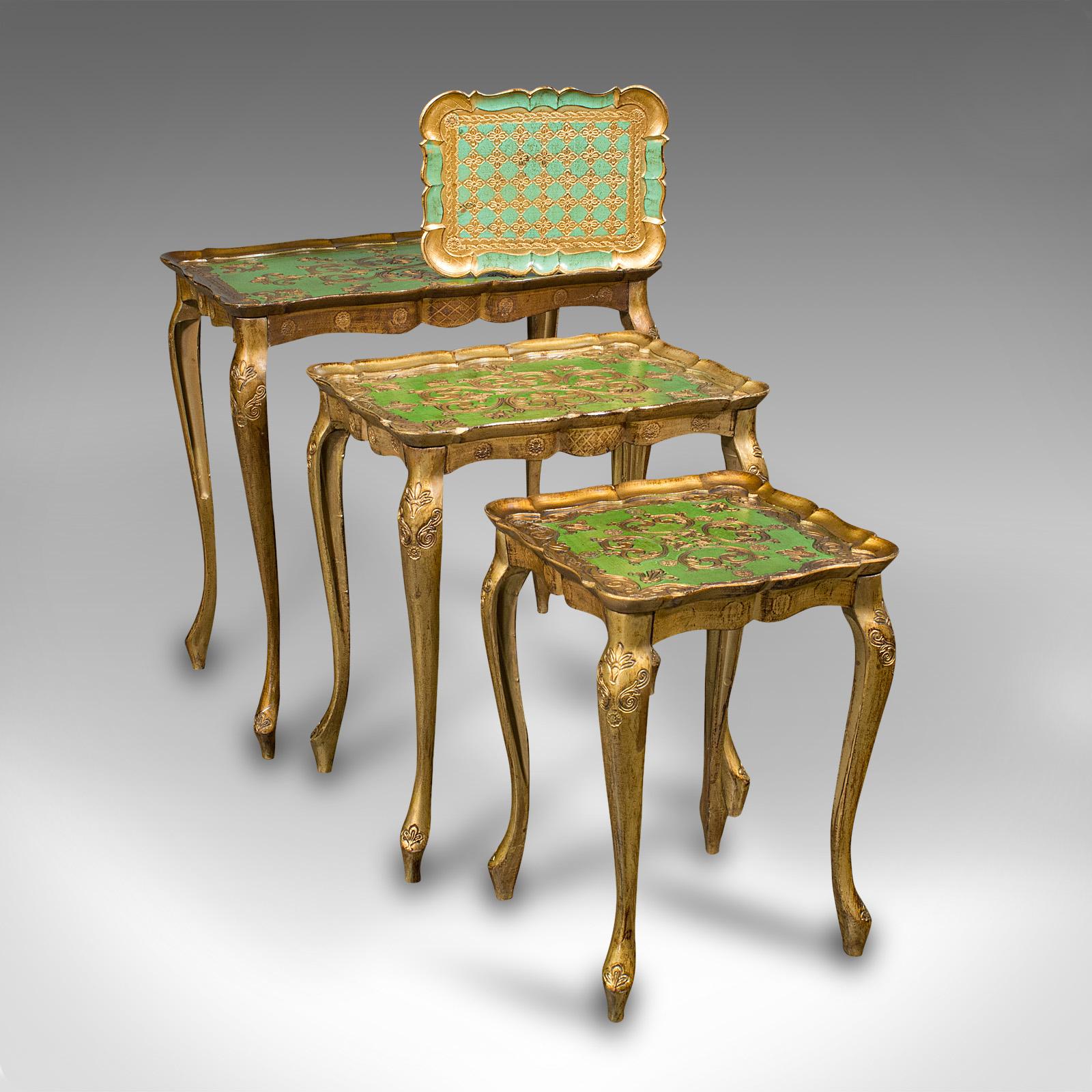 This is a trio of vintage nesting tables. An Italian, gilt composite side table, dating to the late 20th century, circa 1970.

Enthusiastic Rococo revival taste to this distinctive nest of tables
Displaying a desirable aged patina
