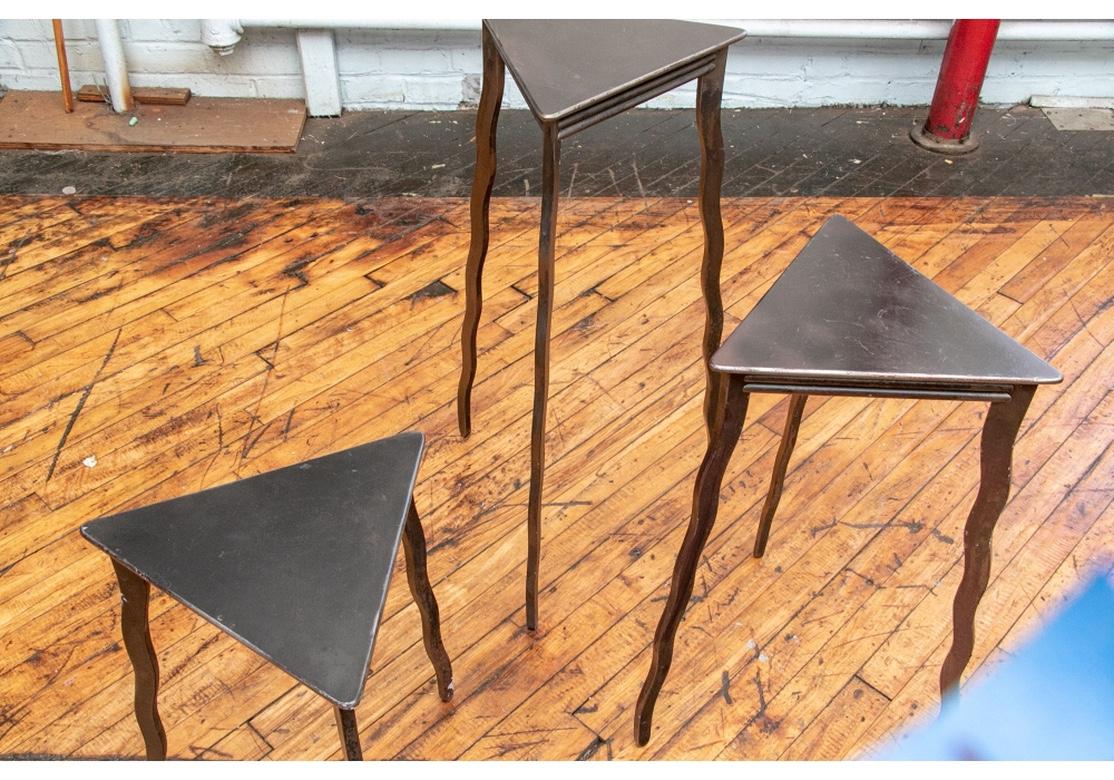 In the 1980’s Craftsman/Artist Will Stone created a very individualistic small line of furniture that effortlessly fused the worlds of Post Modern, Industrial and Organic Modern. This trio of steel tables represent the epitome of Will’s efforts. All