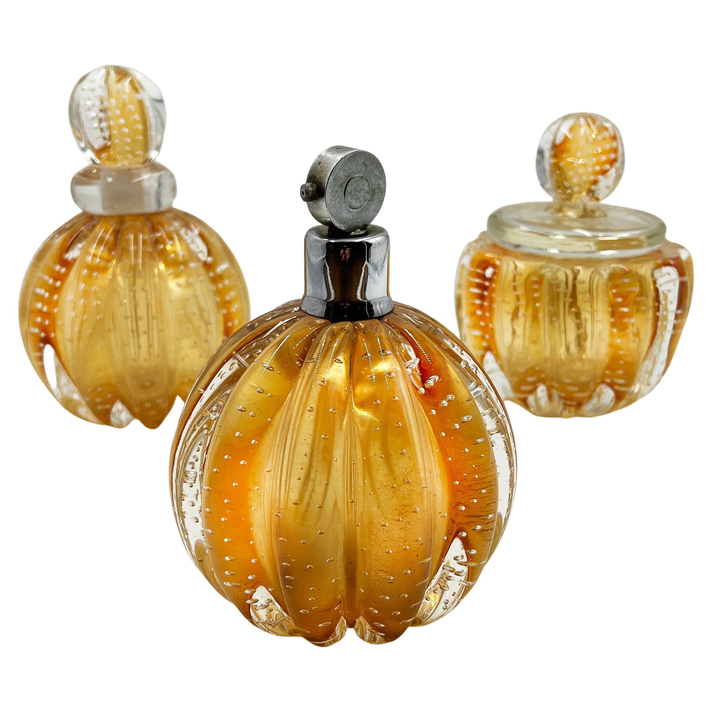 Elegant and original Murano bubble glass bath set consisting of three bottles for powder, perfume and cream.