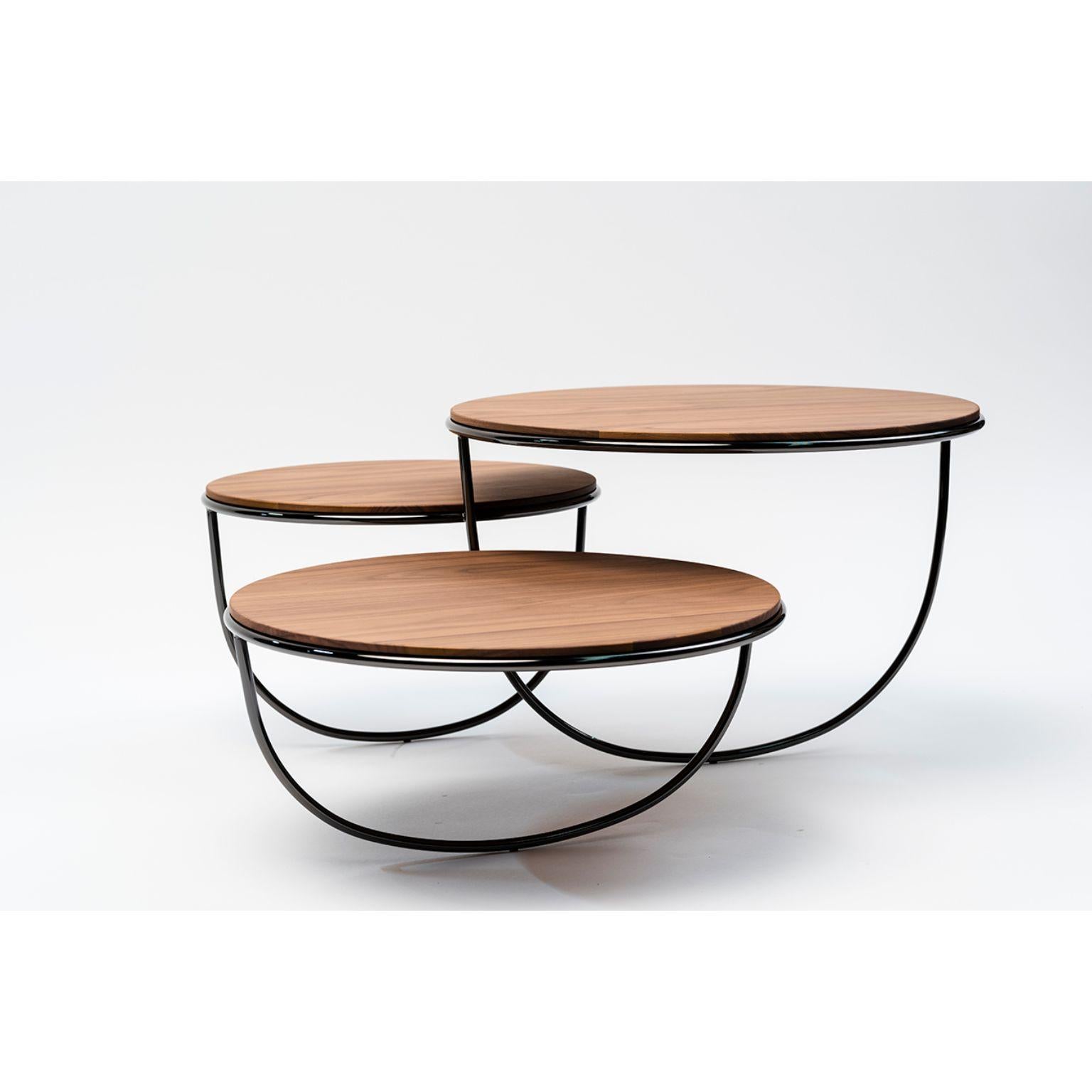 Trio side table by Nendo
Materials: Top: Noce canaletto solid wood, glass or metal
 Structure: Black chrome metal, Black/Light grey NCS 2002 Y50R/Coral NCS 2570 Y70R /Dark 
 Green NCS 8010 B70G powder-coated metal
Dimensions: W84.7 x D76.3 x