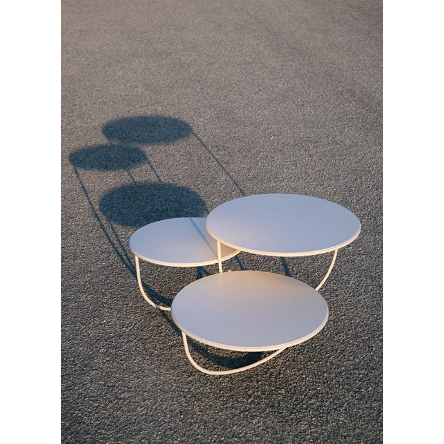 Trio side table by Nendo
Materials: Top: Noce Canaletto solid wood, glass or metal
 Structure: Black chrome metal, Black/Light grey NCS 2002 Y50R/Coral NCS 2570 Y70R /Dark 
 Green NCS 8010 B70G powder-coated metal
Dimensions: W 84.7 x D 76.3 x H