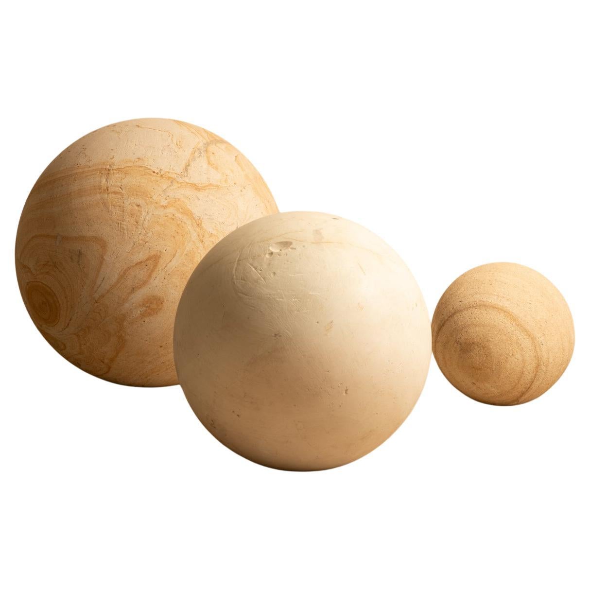 Trio stone spheres For Sale
