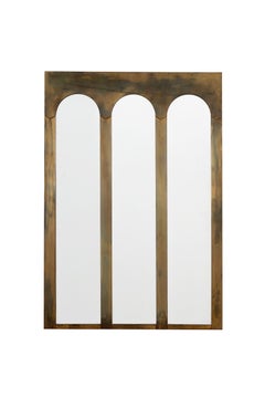 Miroir à triple arc