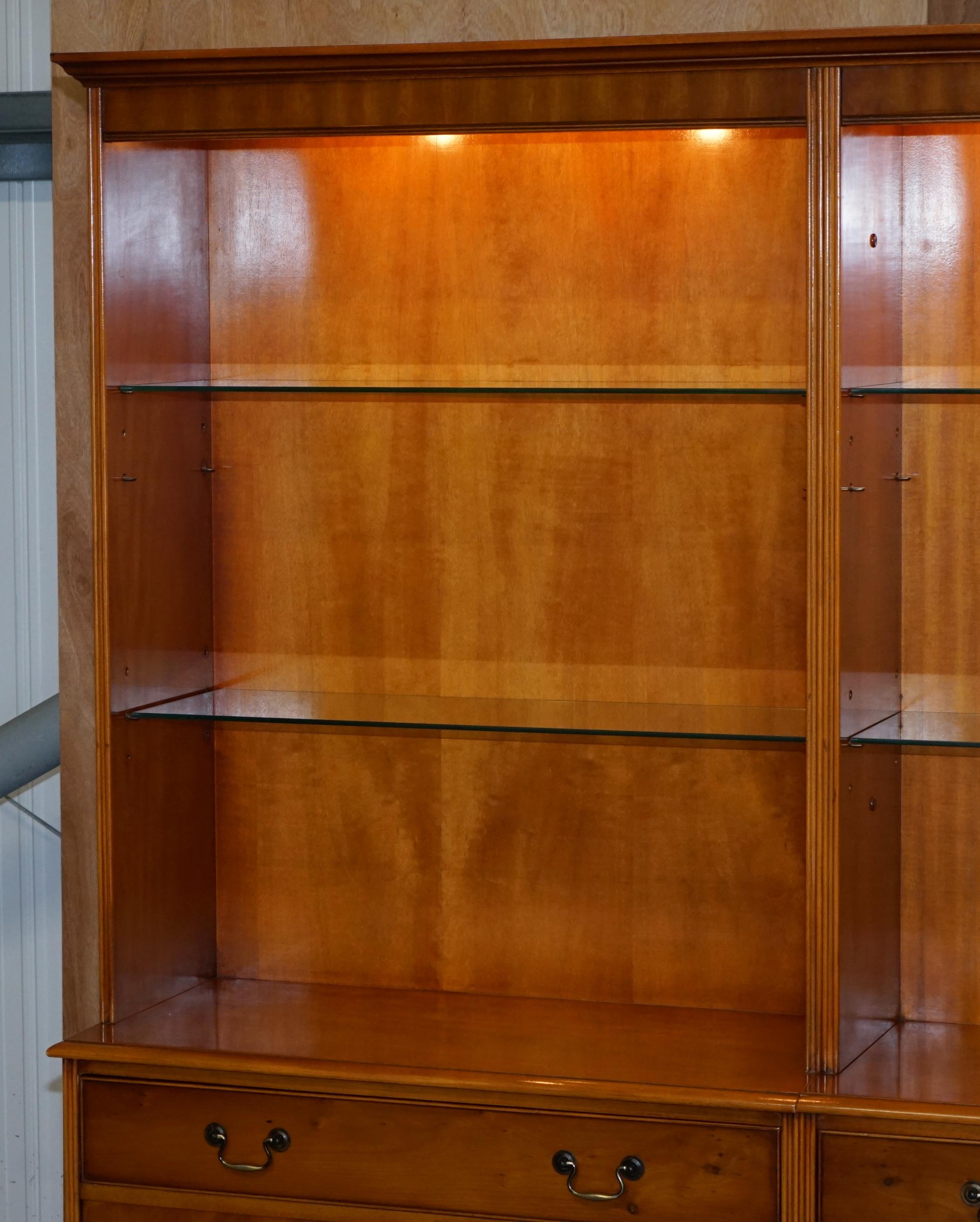 We are delighted to offer for sale this stunning very decorative Bradley Furniture triple bank Library bookcase or display cabinet with glass shelves and lights 

A very good looking and well made piece. Bradley furniture make some of the finest