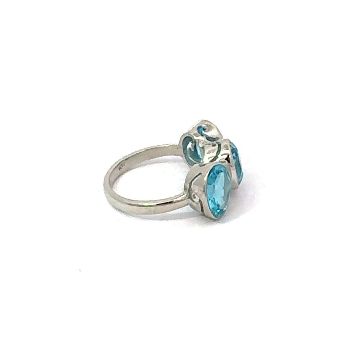 in vendita:  Anello unisex sfaccettato con triplo topazio blu per lui in A. Silver 925 3
