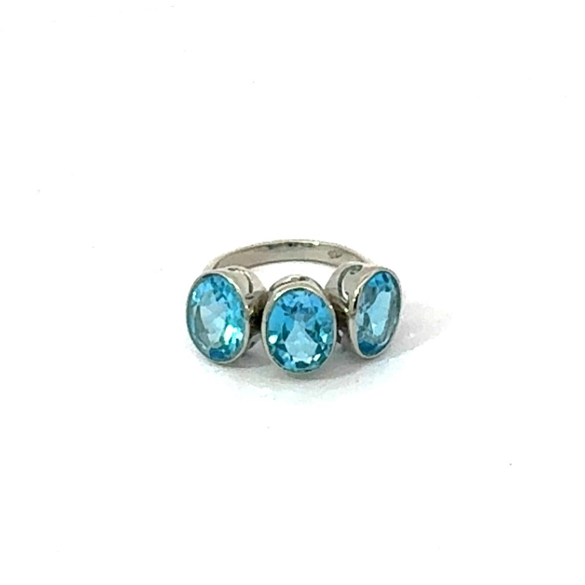 in vendita:  Anello unisex sfaccettato con triplo topazio blu per lui in A. Silver 925 6