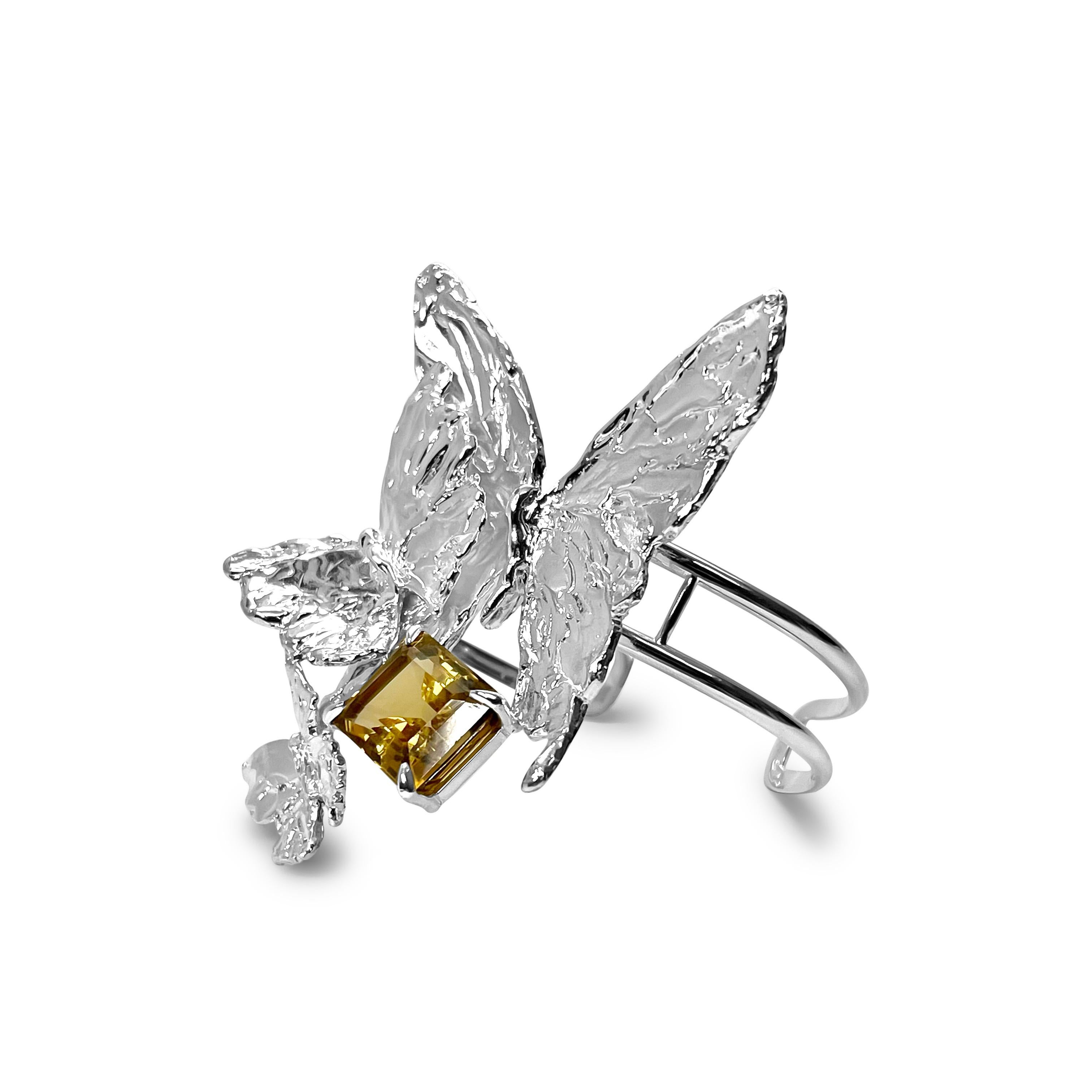 Intention: Sheer drama... the good kind!

Design: A trio of butterflies surround an emerald cut citrine in this stunning cuff. Embodying the intention of our BELIEVE collection, this piece demands that you think big and bold(ly)!

Style Suggestions: