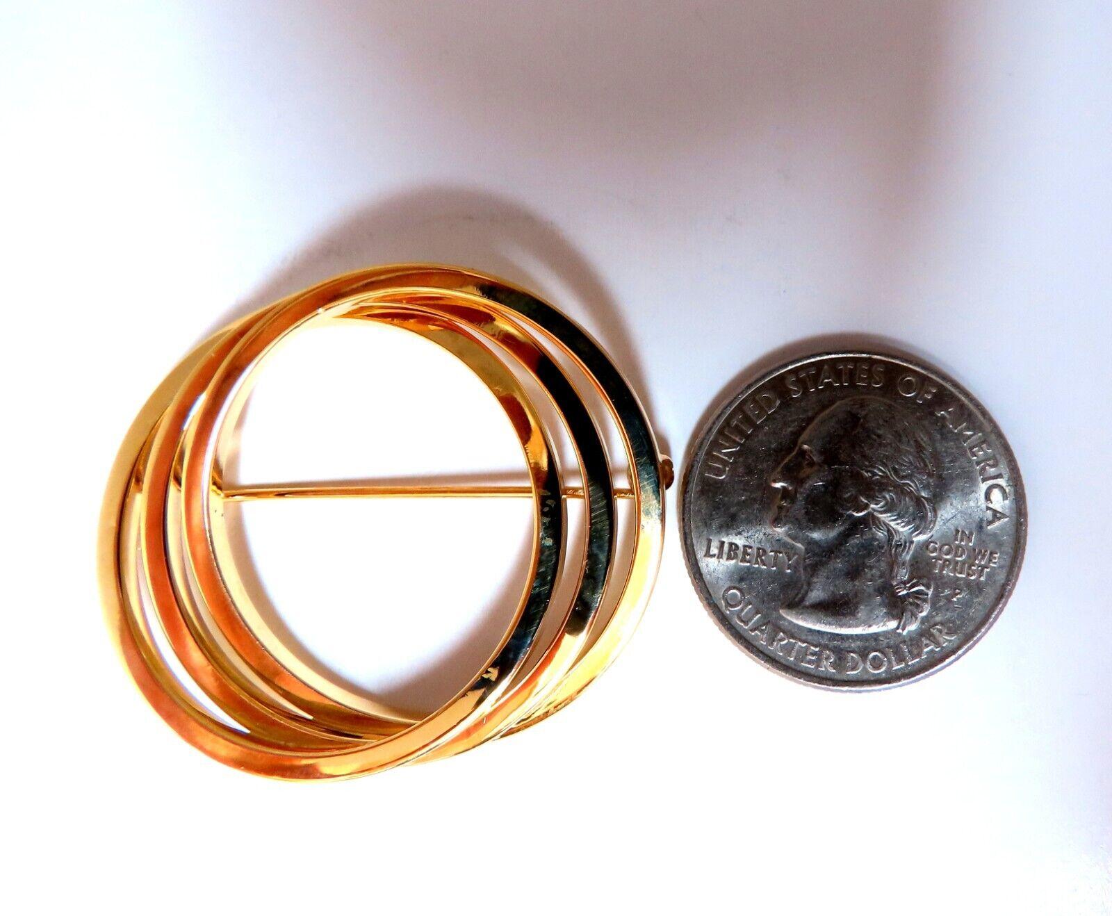 Circles Pin.

40 x 33mm diameter

18kt. yellow gold 

5.8 grams