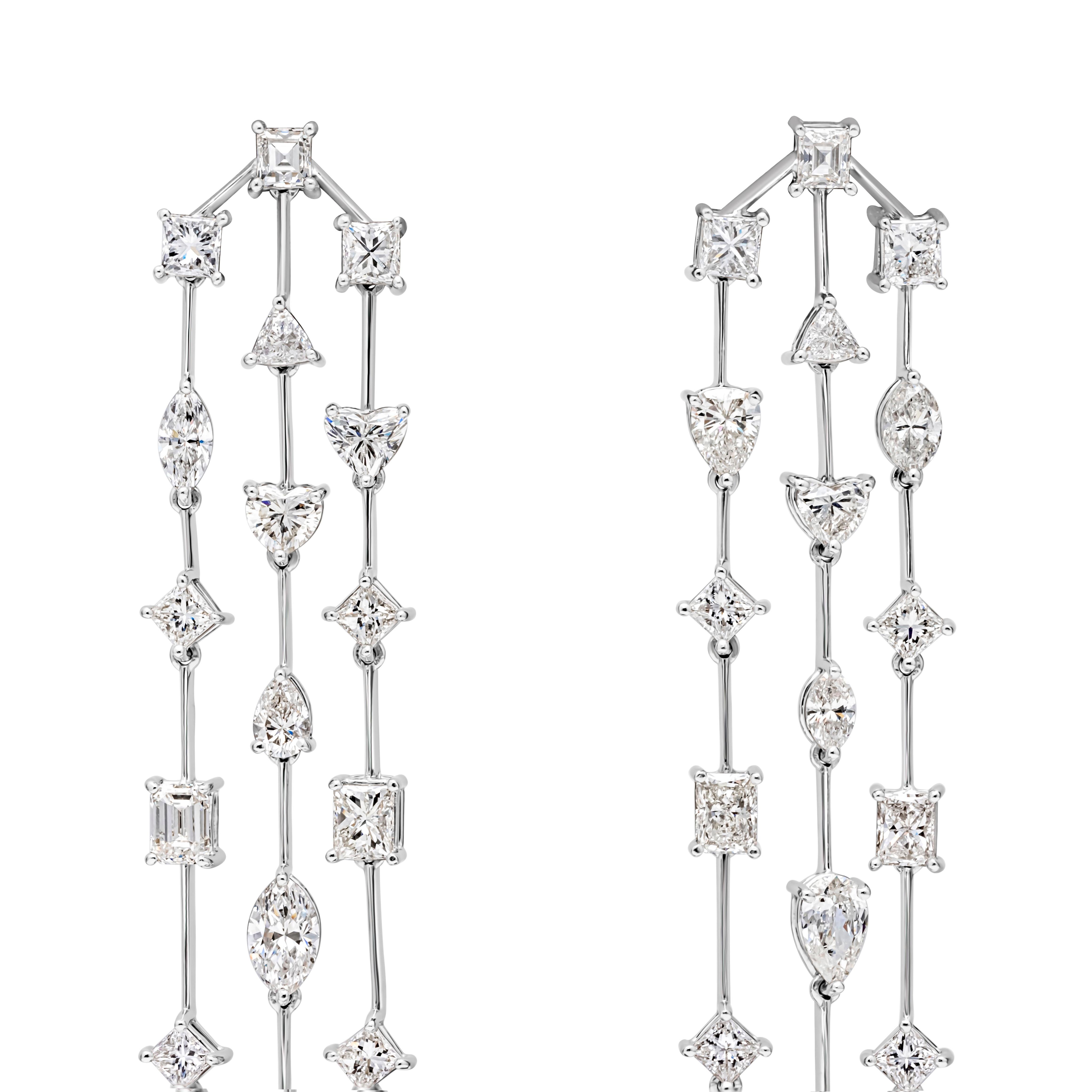 This stunning and fashionable chandelier earring features 3 columns set with different fancy cut diamonds. Total weight of the diamonds is 9.15 carats. The diamonds range from F-G color and VS-SI1 in clarity. Made in 18k white gold. 

Roman Malakov