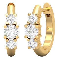 Boucles d'oreilles créoles huggies à trois diamants en or 14 carats